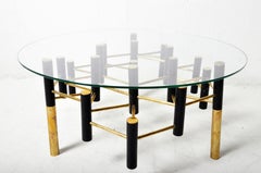 Coffee Table with Metal Cylinder Legs and a Glass Top