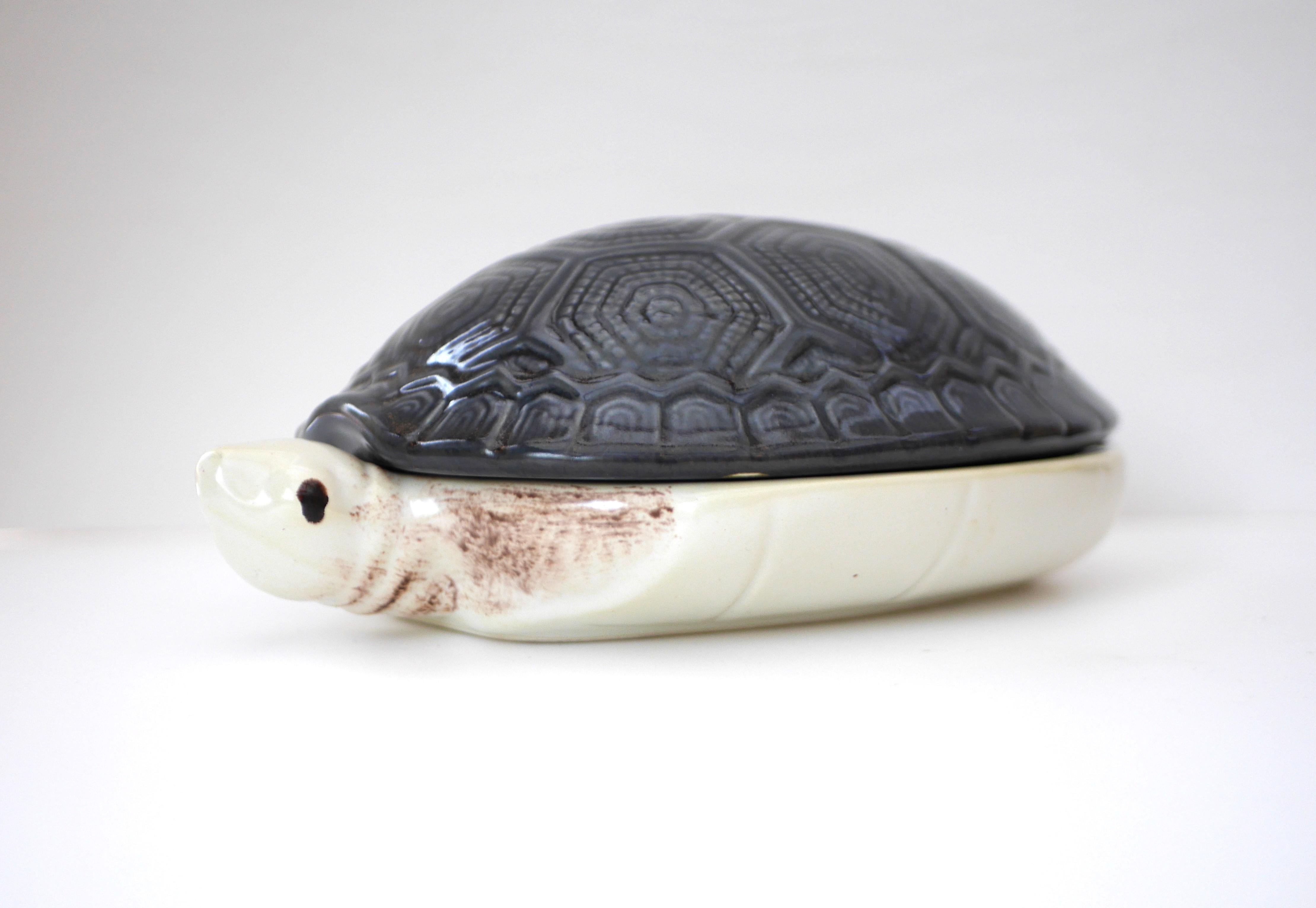 A fantastic vintage French Majolica Turtle Paté Terrine or Tureen by Michel Caugant. These terrines were decorated by hand, from the famous charcuterie Michel Caugant. It is from the 1970s and these tureens are by now very collectable, and this is a