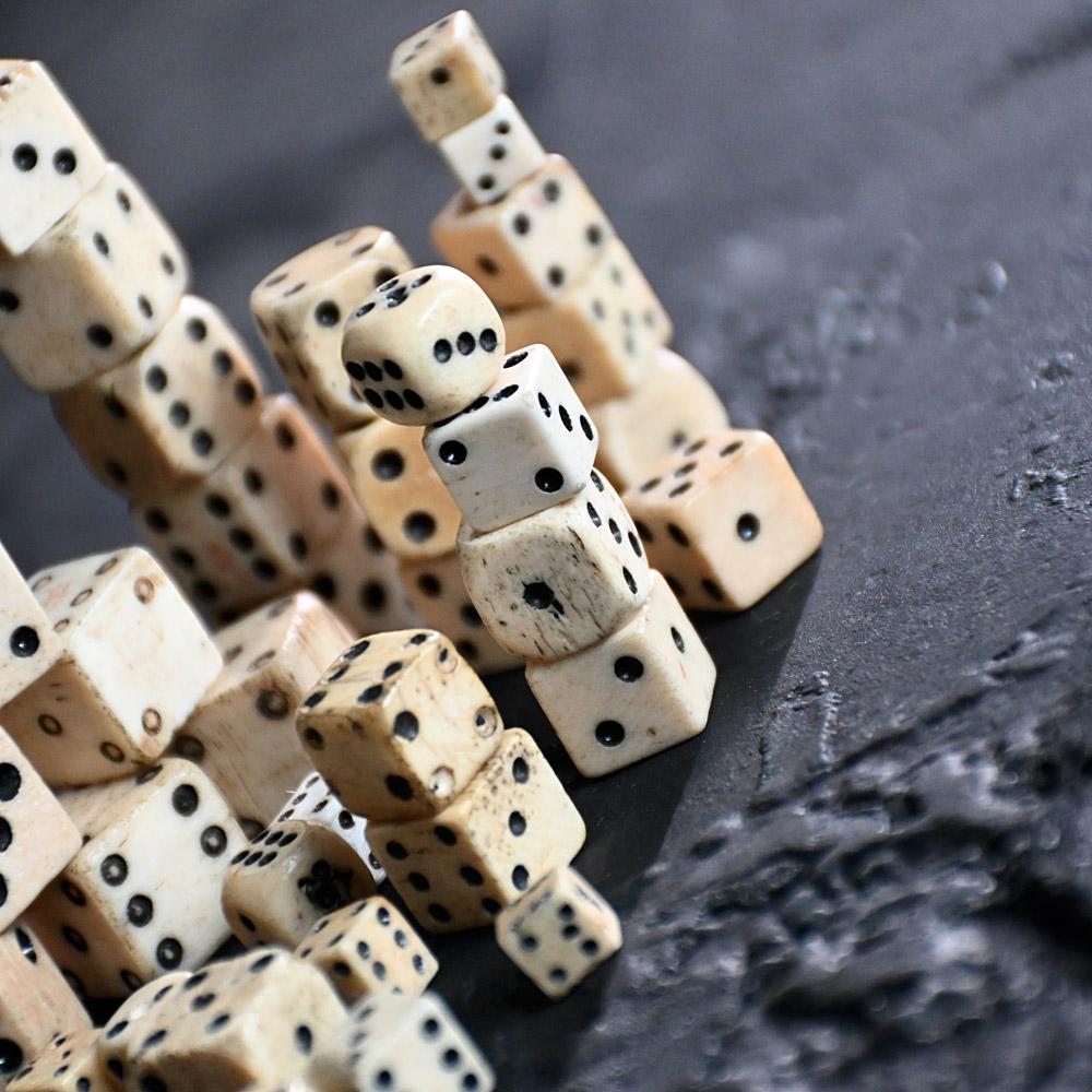 Hand-Crafted Collection of 19th Century Bone Dice For Sale