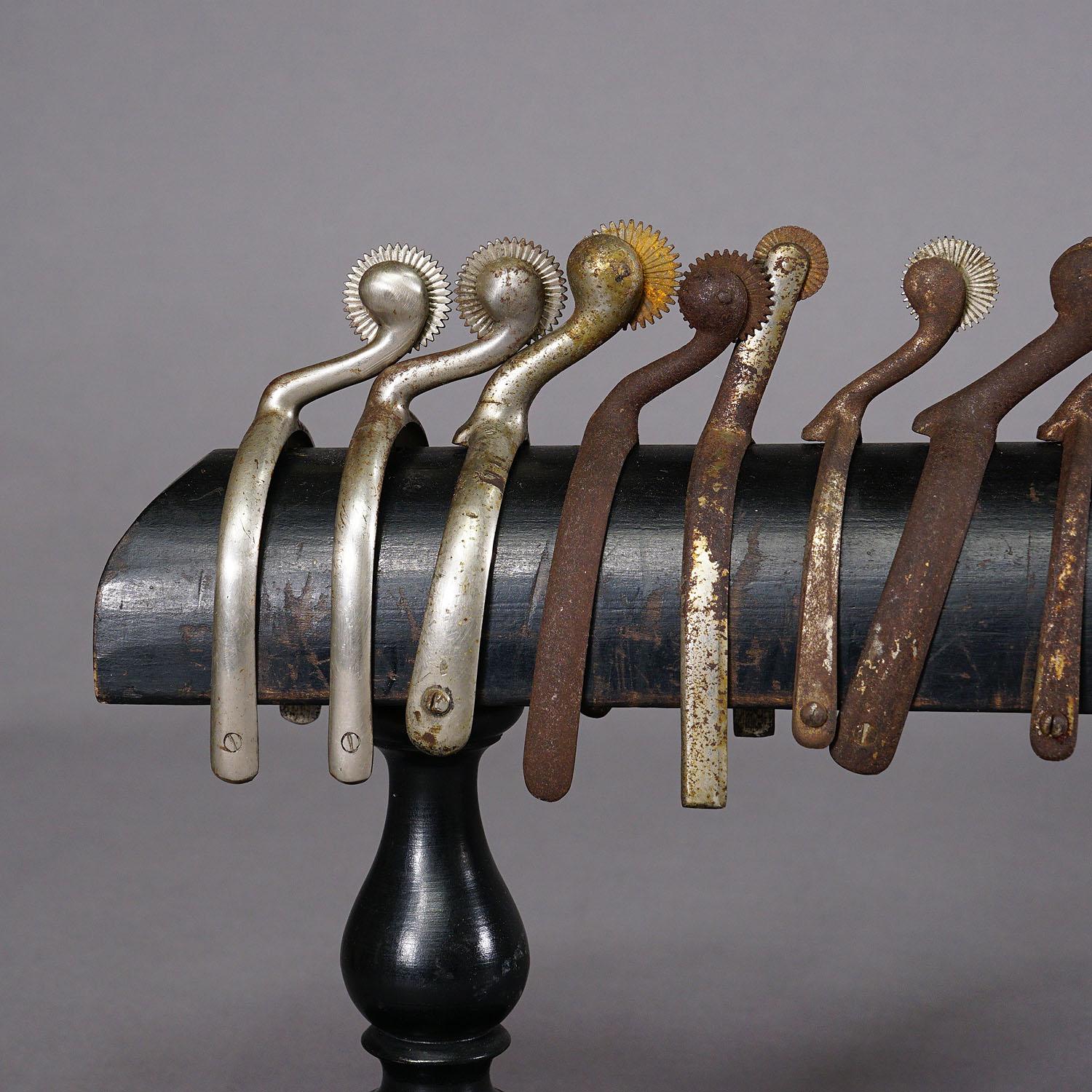 20th Century A Collection of 24 Riding Spurs on a Wooden Rack For Sale