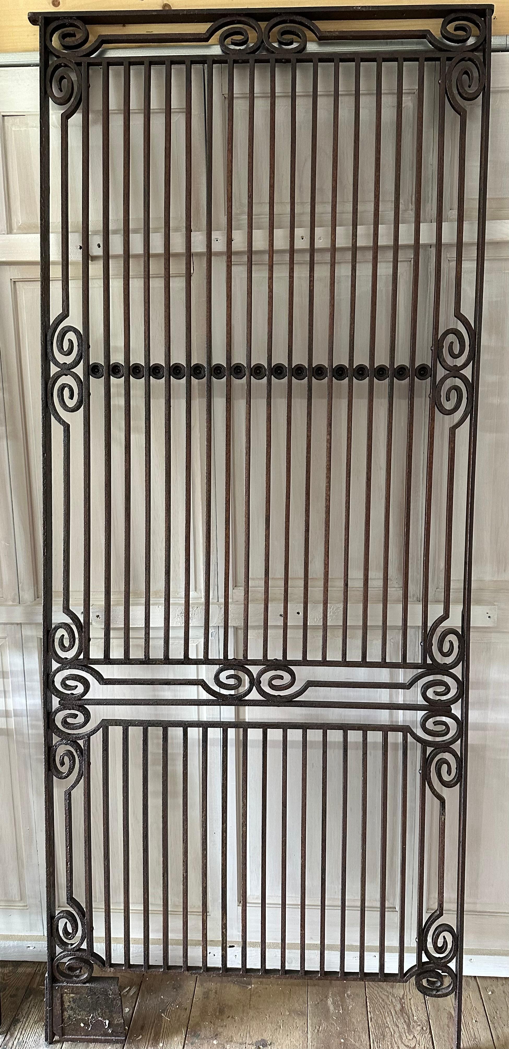 A collection or a group of 7 antique metal wrought iron gate panels.  Depending on your needs, you can buy a single panel or all 7.  These gates offer a wonderful opportunity to create a spectacular entrance, wall or gateway to a driveway, entrance 