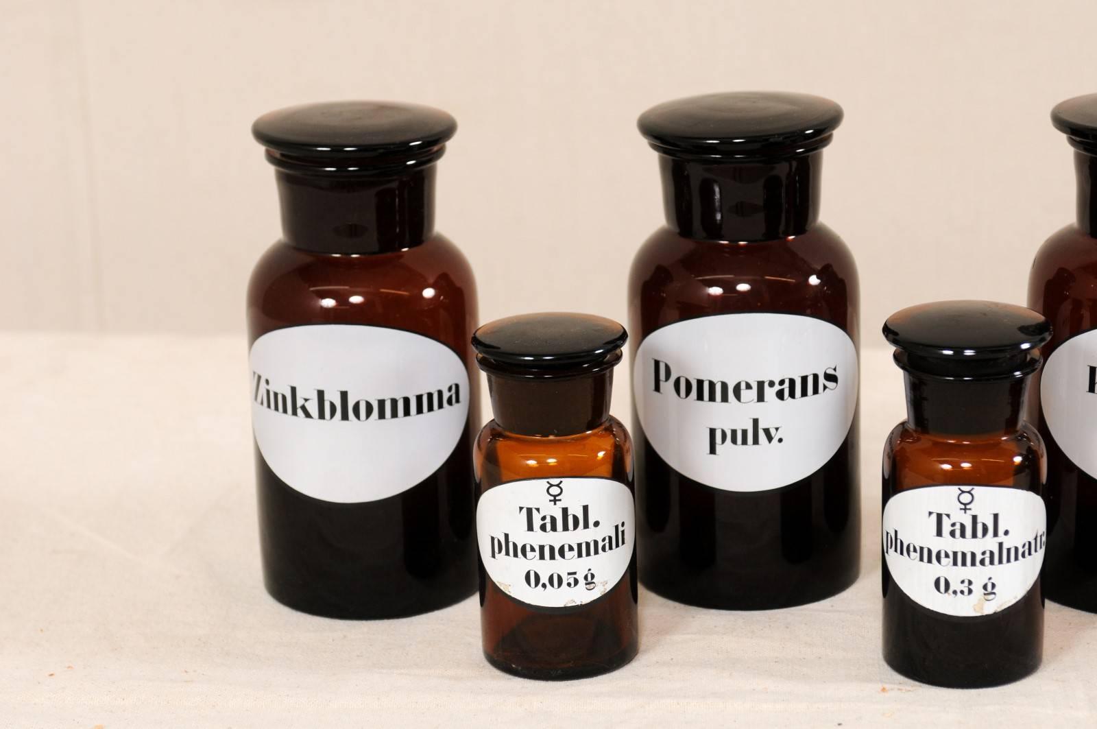 Collection of Seven Antique Swedish Apothecary Jars from the Early 20th Century In Good Condition For Sale In Atlanta, GA