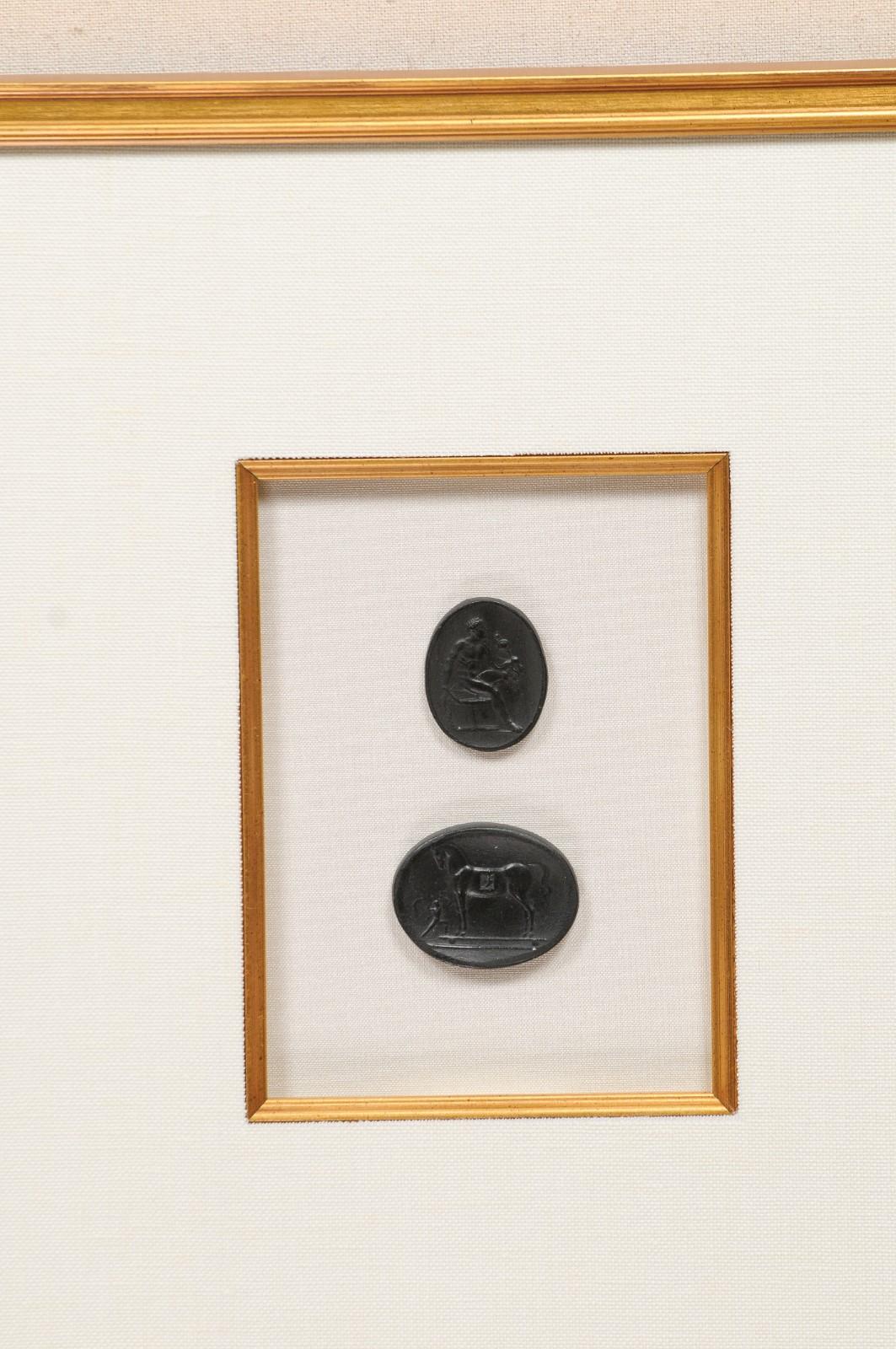 Collection of Black Intaglio Seals, Displayed Within Custom Golden Wood Frames 6