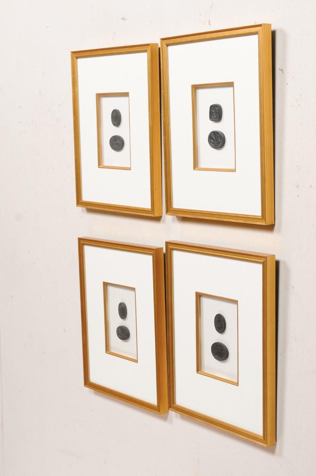 Collection of Black Intaglio Seals, Displayed Within Custom Golden Wood Frames 2