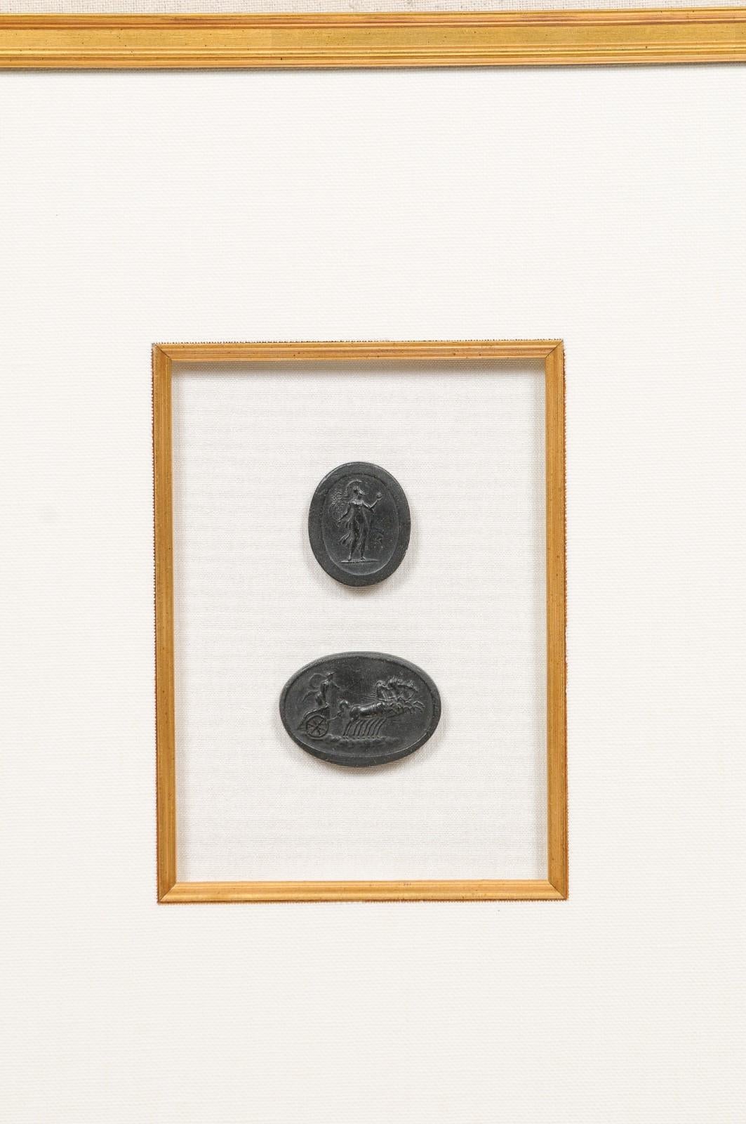 Collection of Black Intaglio Seals, Displayed Within Custom Golden Wood Frames 4