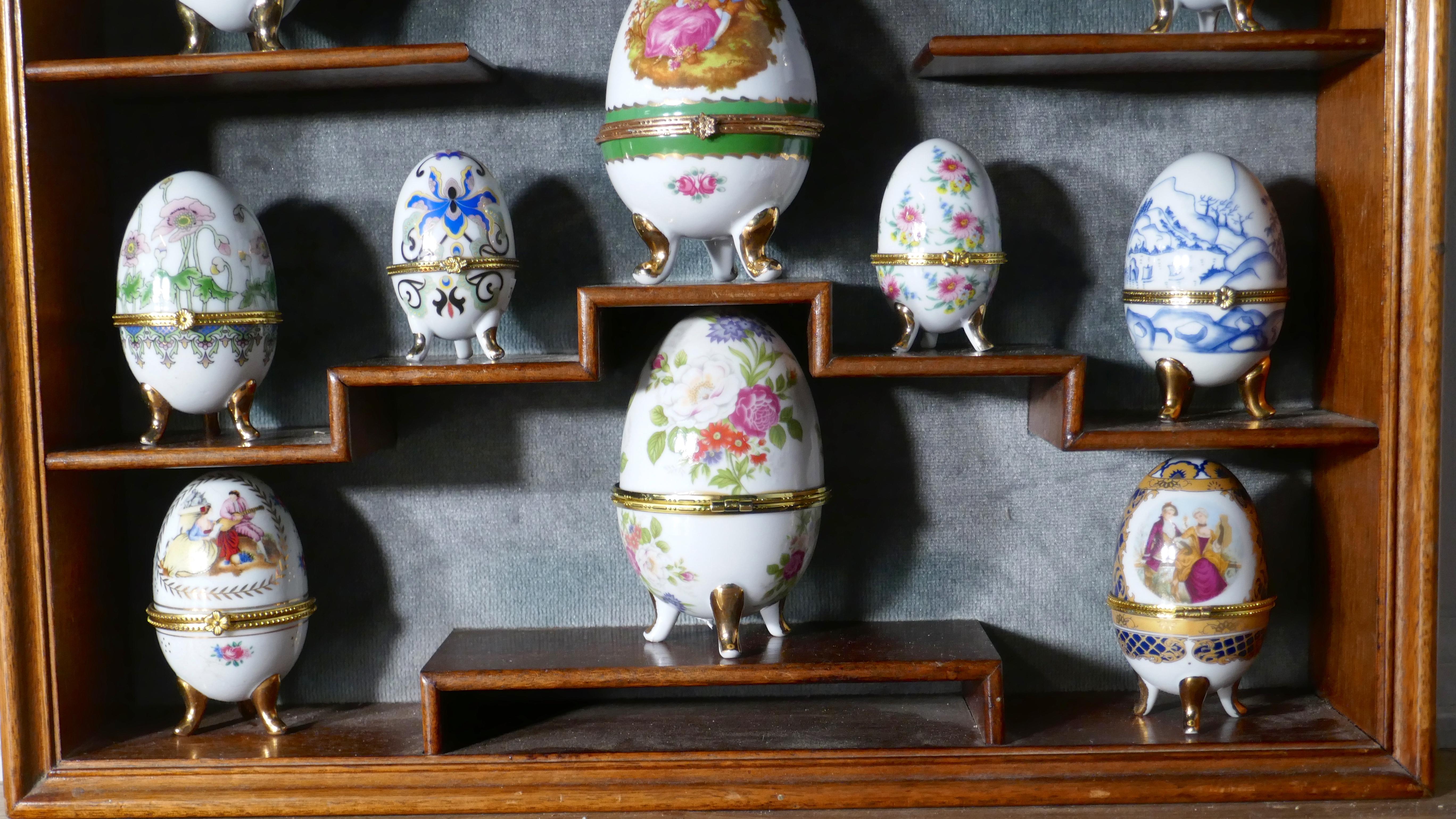 20th Century Collection of Ceramic Egg Trinket Boxes, in Original Art Deco Display Shelf