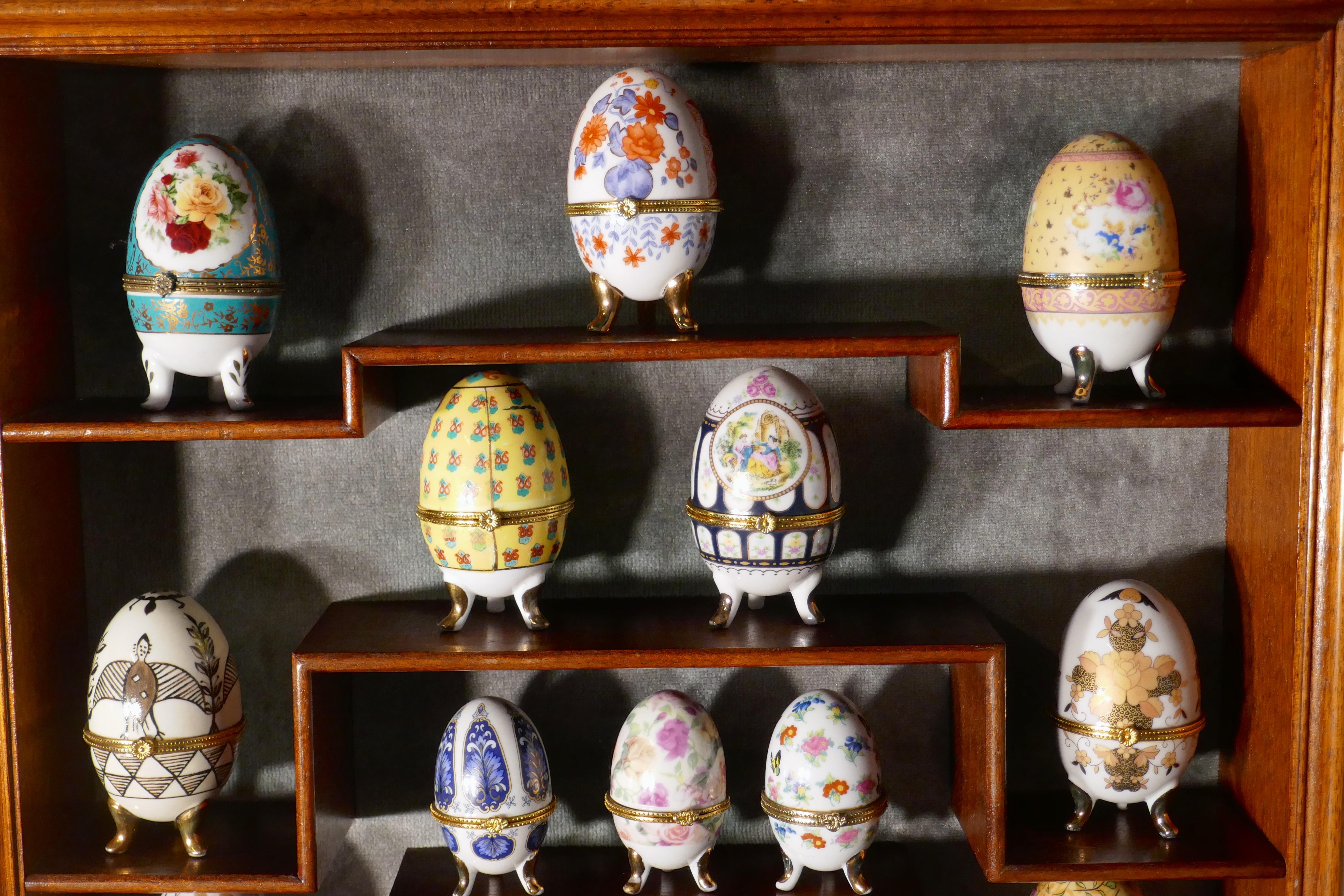 Mahogany Collection of Ceramic Egg Trinket Boxes, in Original Art Deco Display Shelf