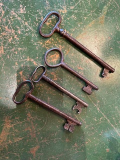 A collection of four 19th century iron keys