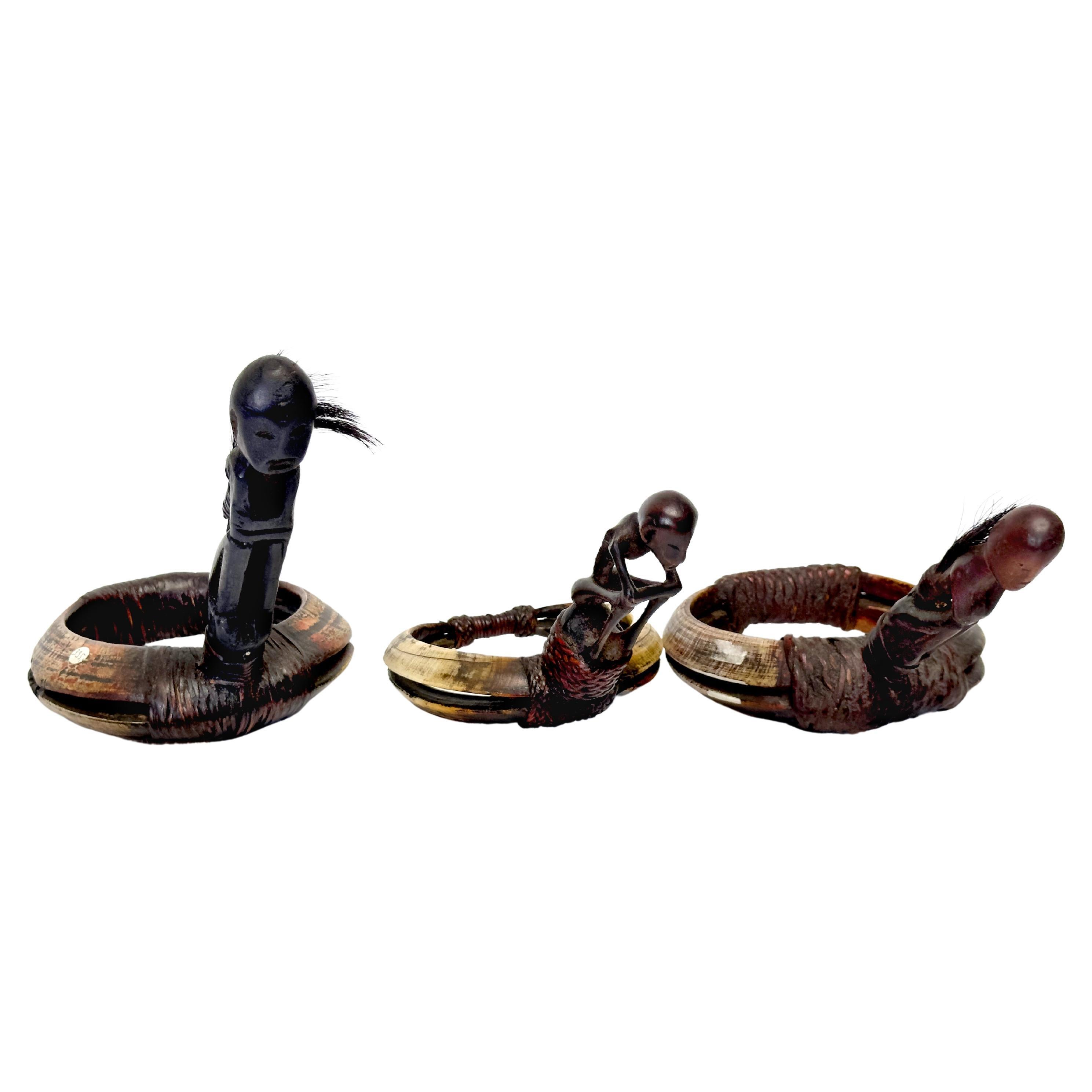 Una colección de cuatro brazaletes de guerrero Ifugao en venta
