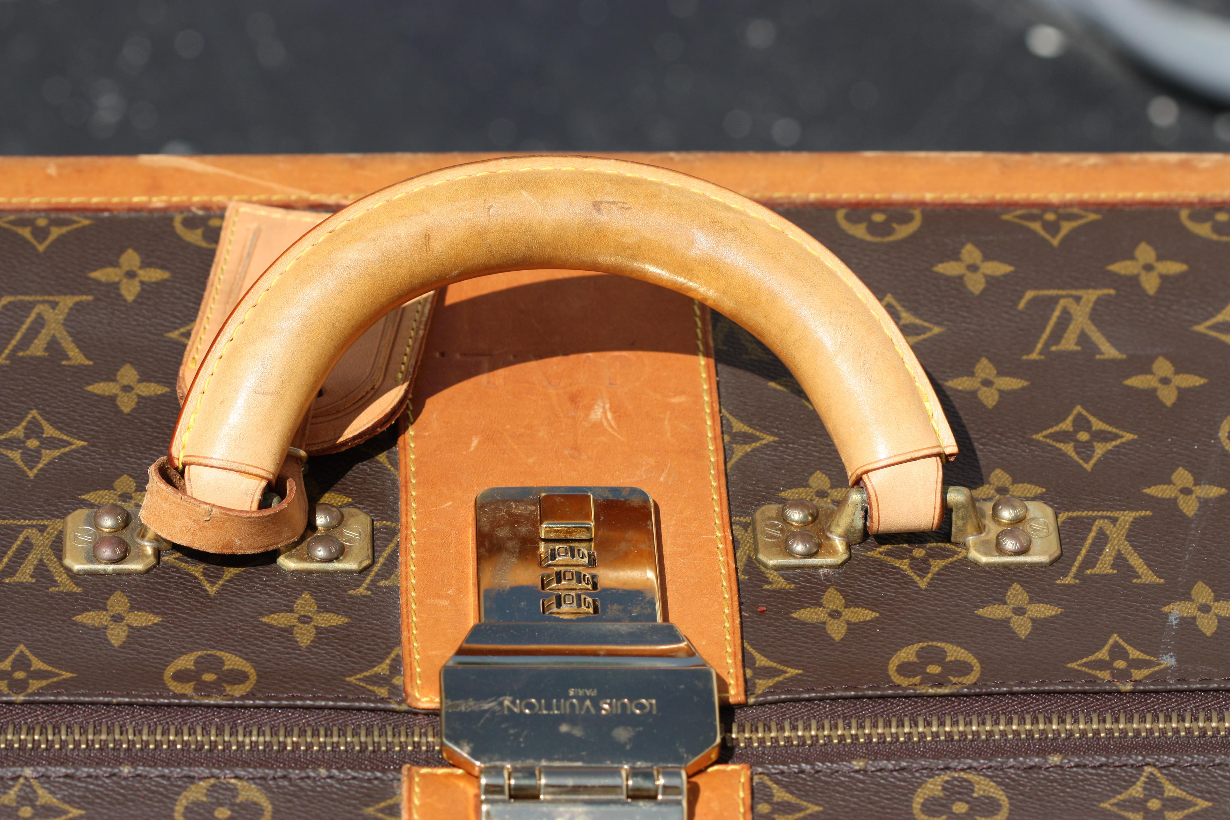 Leather Collection of Four Louis Vuitton Suitcases with Monogram Pattern