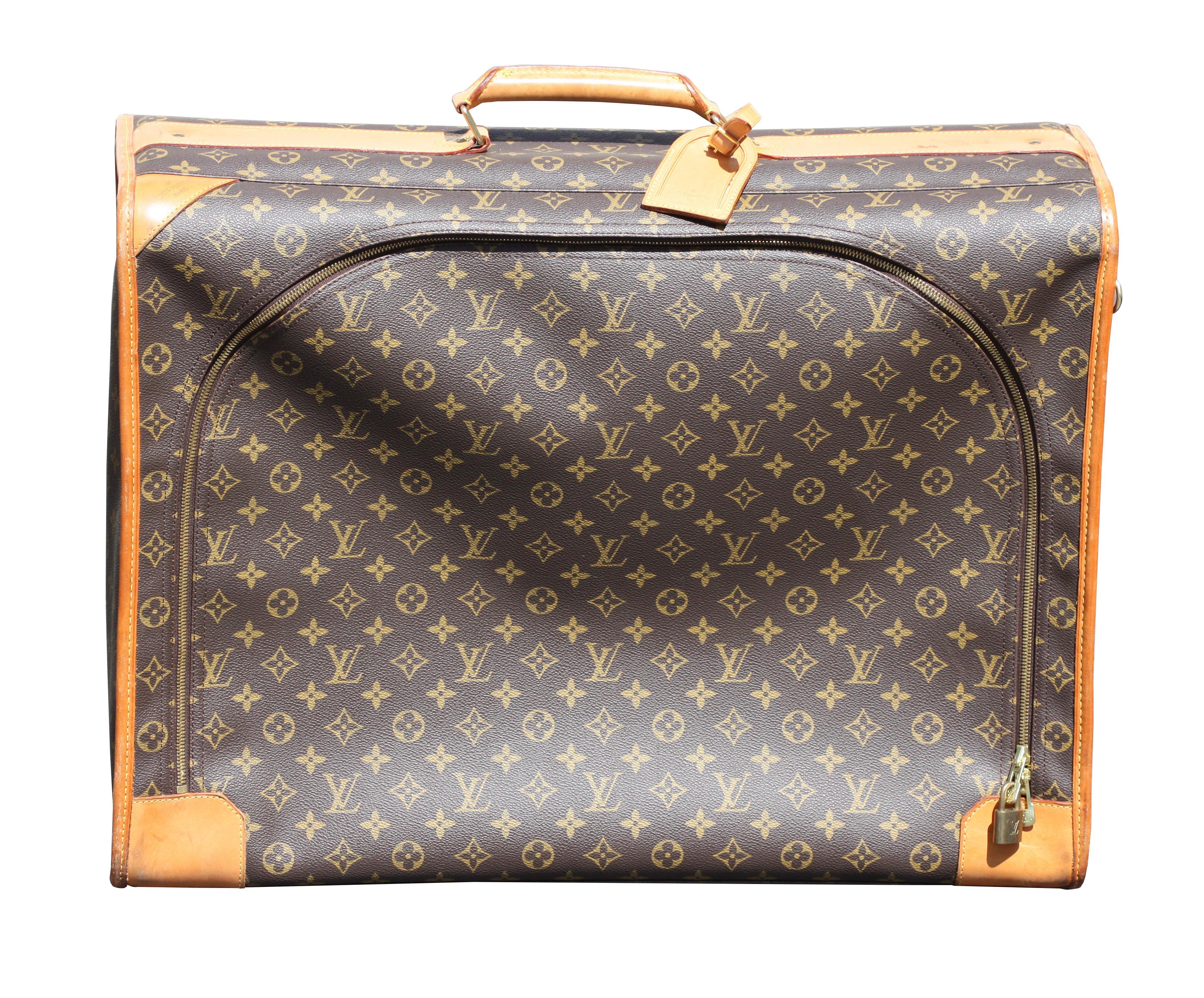 Collection of Four Louis Vuitton Suitcases with Monogram Pattern 1
