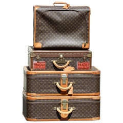 Vintage Collection of Four Louis Vuitton Suitcases with Monogram Pattern