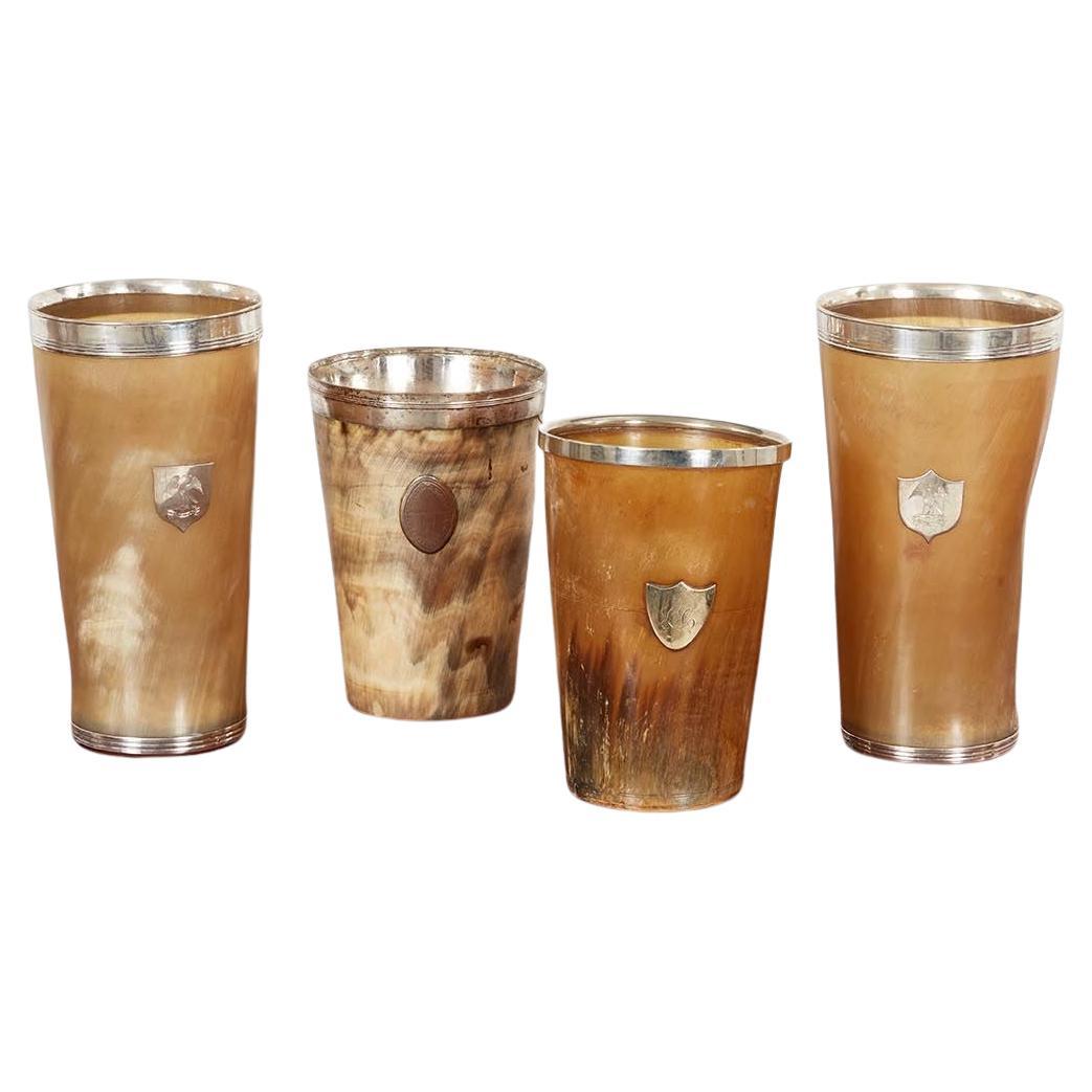 The Collective of Four Extra Large Silver Rimmed Horn Cups (Collection de quatre très grandes coupes en corne bordées d'argent)