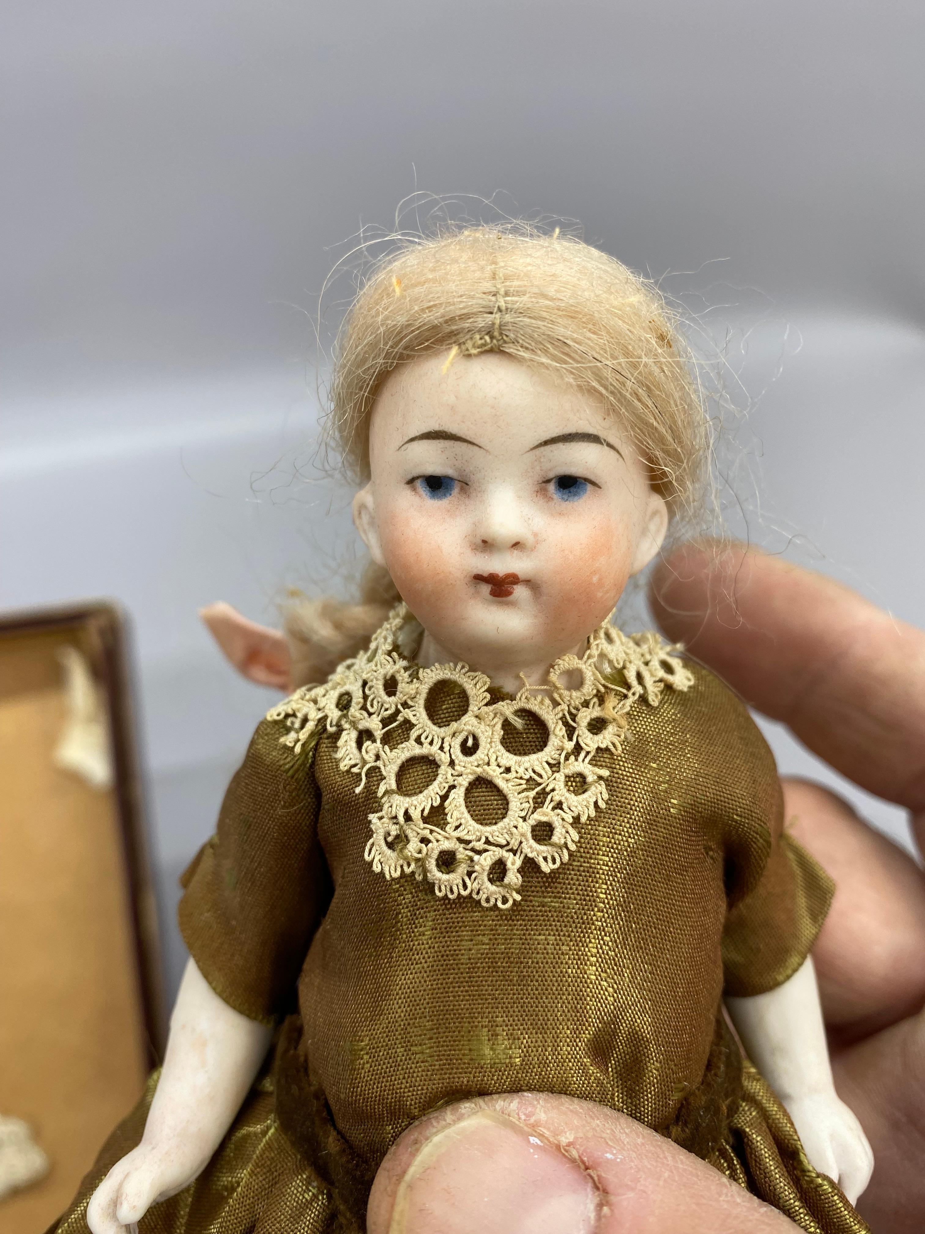 A Collection of German Bisque Hand-Painted Miniature Dolls, Five 4