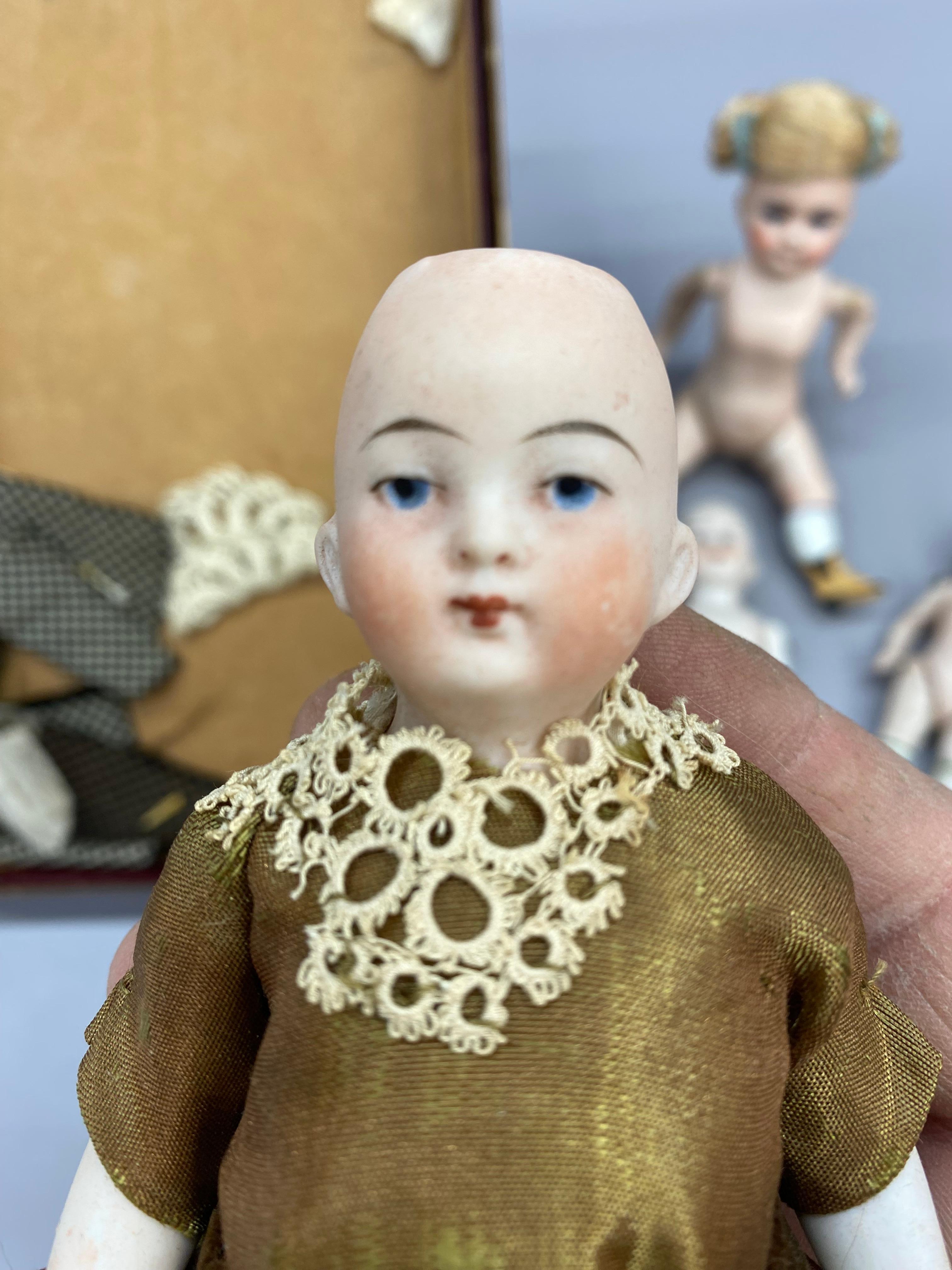 A Collection of German Bisque Hand-Painted Miniature Dolls, Five 5