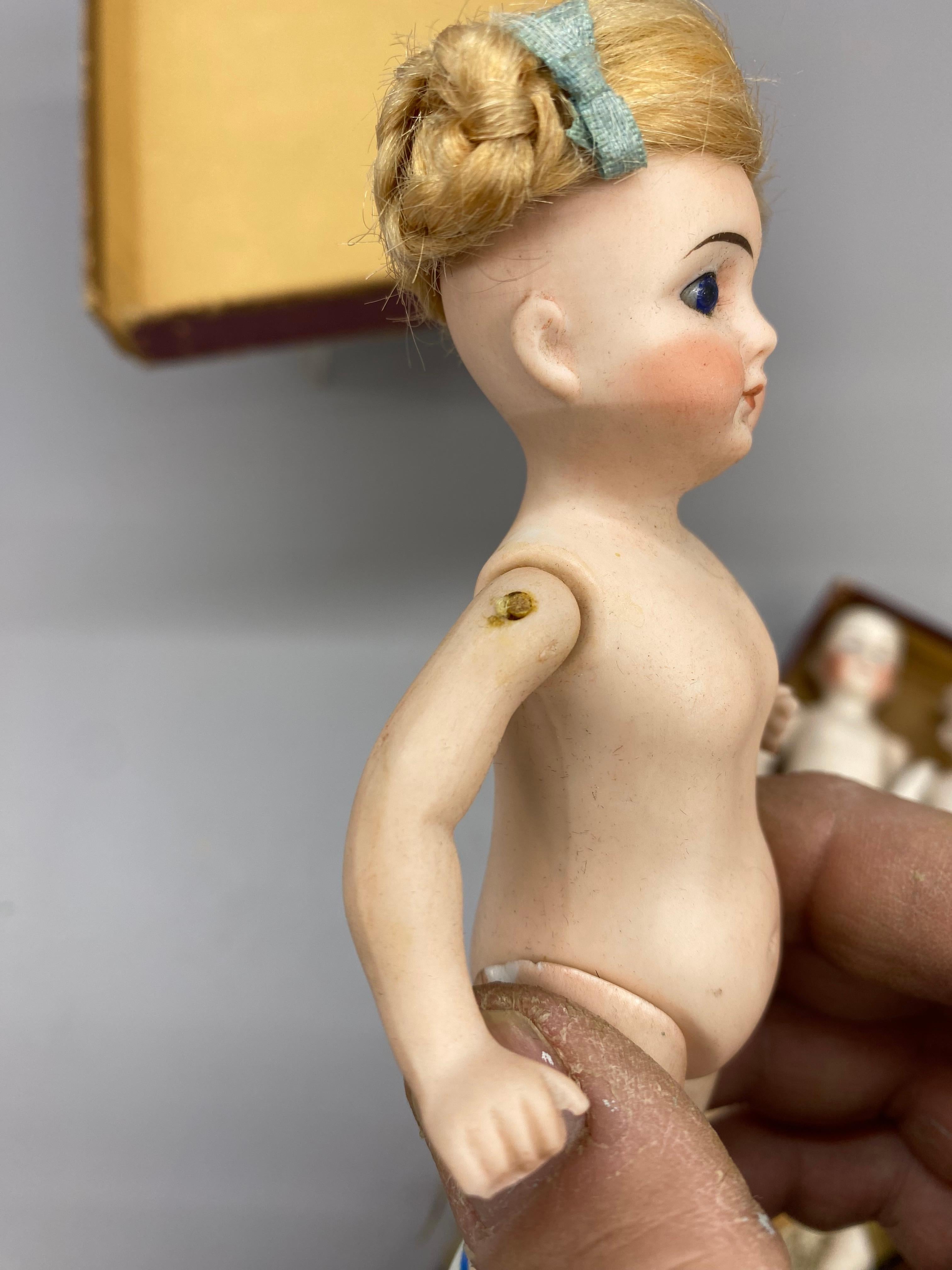 A Collection of German Bisque Hand-Painted Miniature Dolls, Five 7