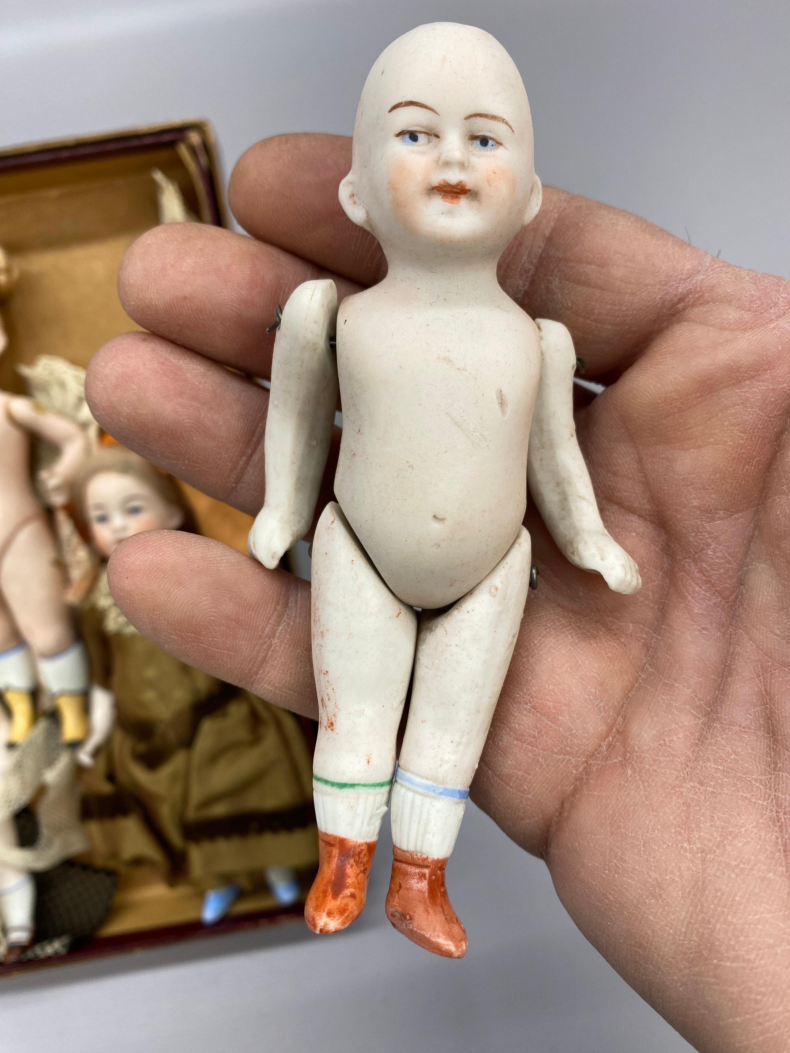 A Collection of German Bisque Hand-Painted Miniature Dolls, Five 8