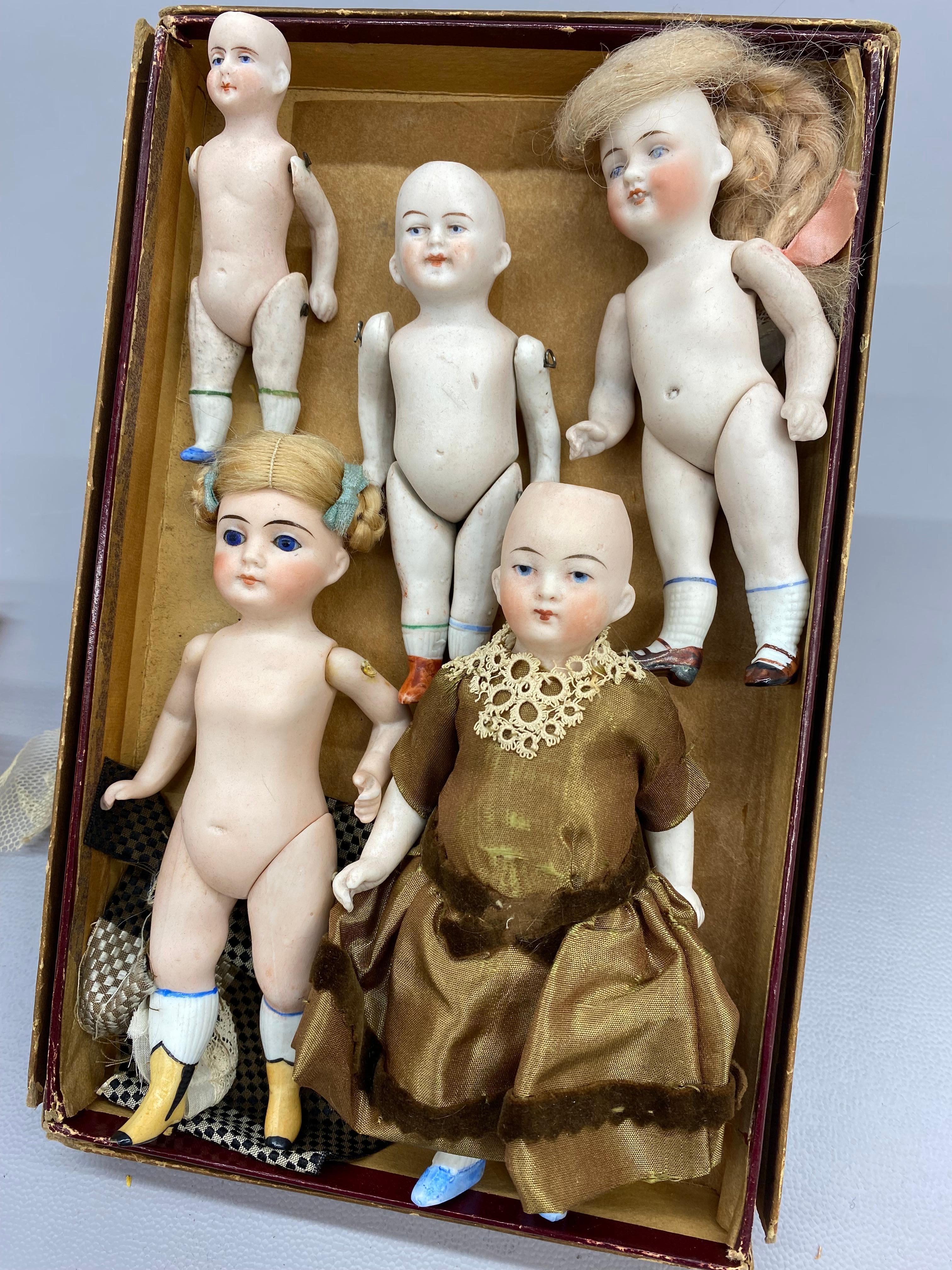 Victorian A Collection of German Bisque Hand-Painted Miniature Dolls, Five