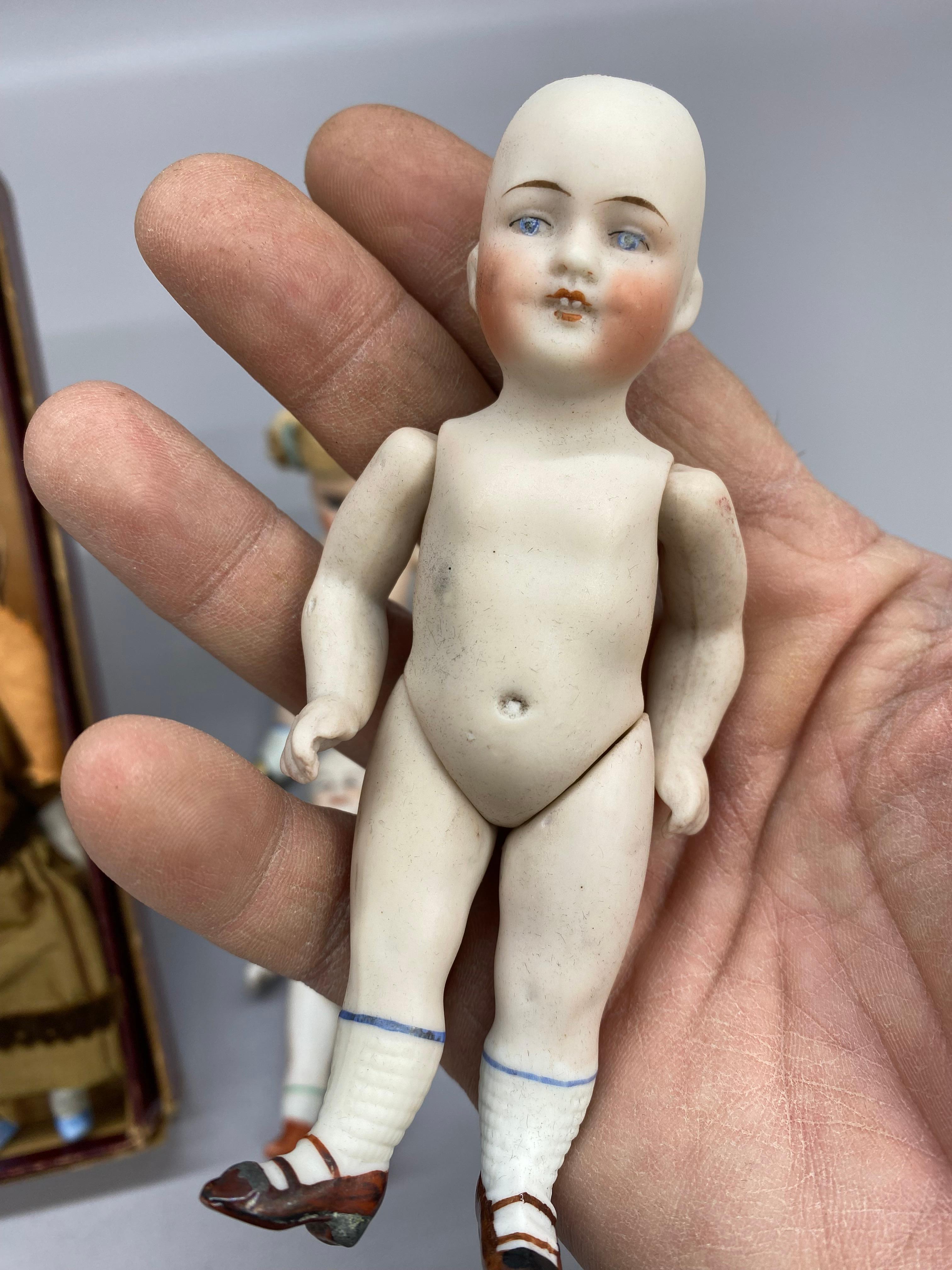 20th Century A Collection of German Bisque Hand-Painted Miniature Dolls, Five