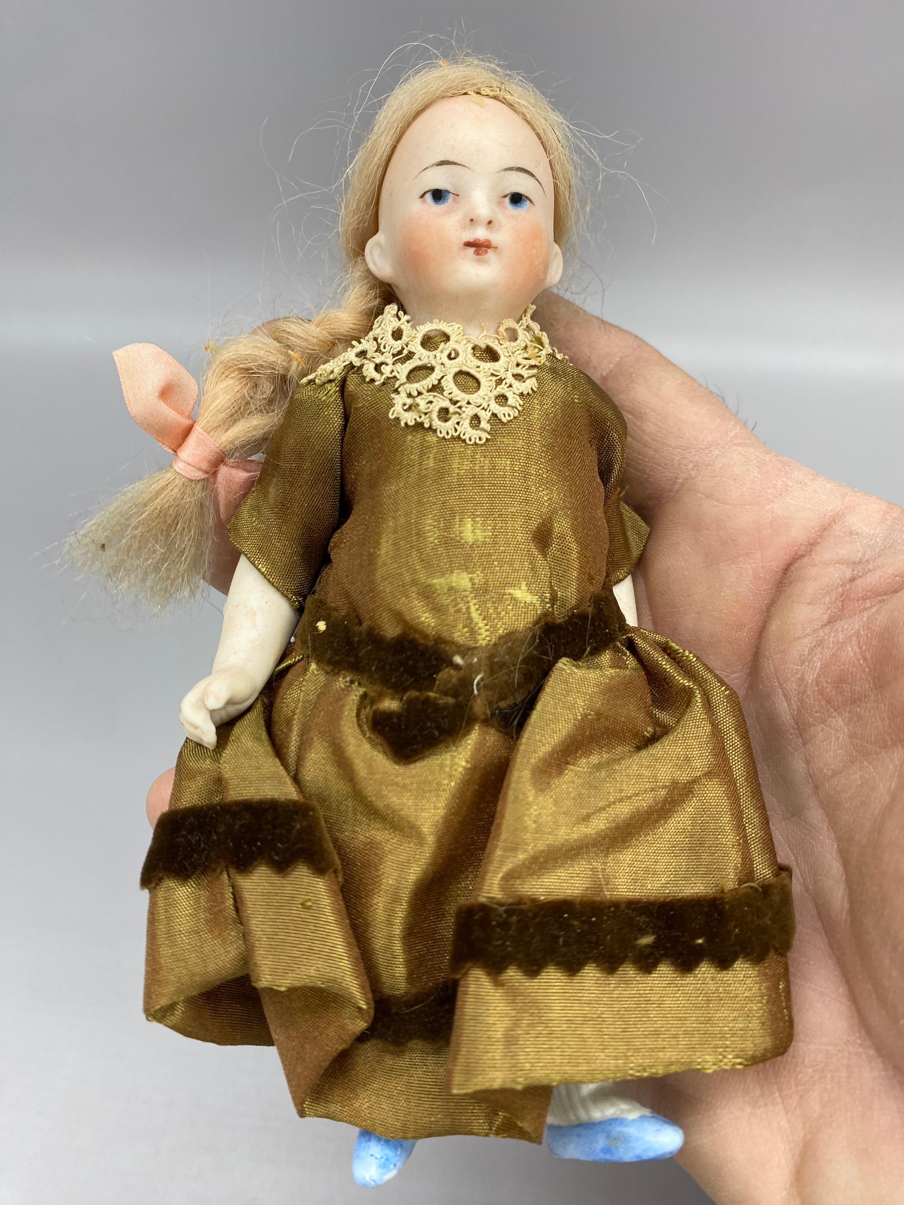 A Collection of German Bisque Hand-Painted Miniature Dolls, Five 3