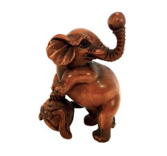 A Collection of Miniature, Hand-carved Elephant Netsukes