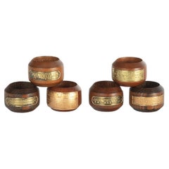 A collection of napkin rings made from the timbers of Victory