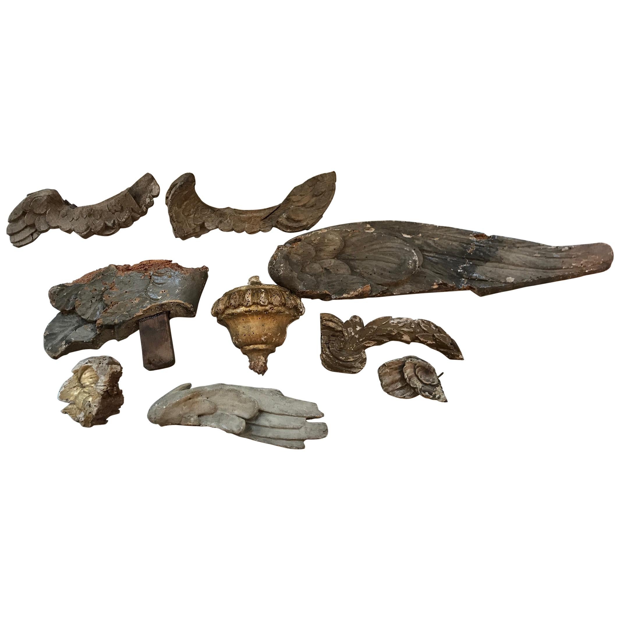 Collection of Nine Early 18th Century Italian Wood Fragments of Wings and Urns For Sale