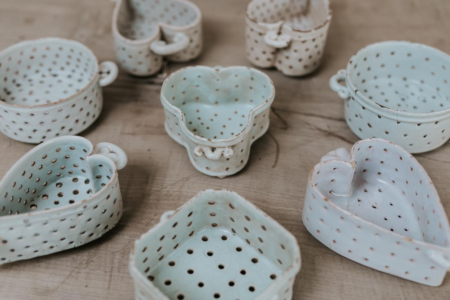 This is a collection of 8 French 18th century porcelain soft cheese moulds, collected by a French antiques dealer over 35 years time,
extremely rare find.