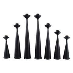 Collection of Seven Scandinavian Designer Candlesticks in Wood and Brass