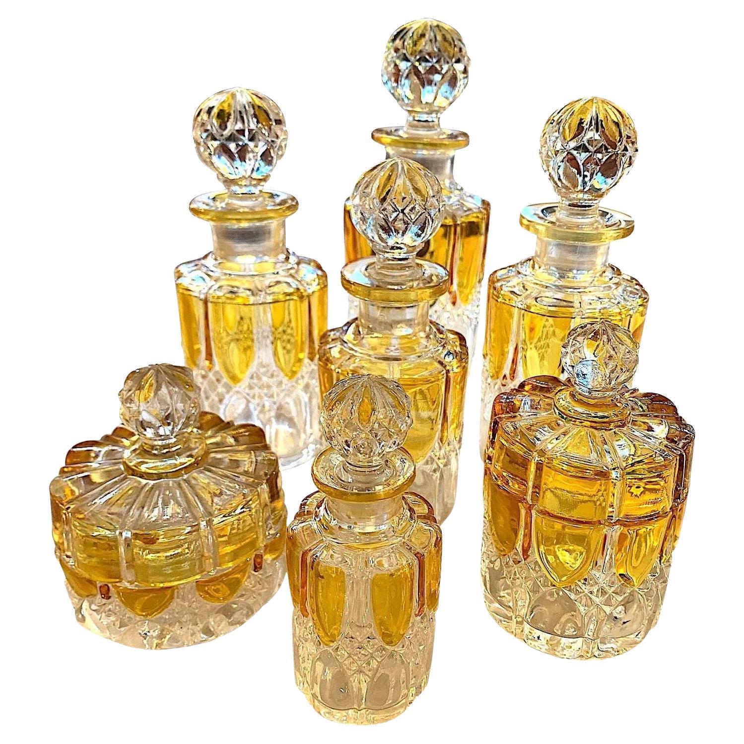 Colección de siete frascos de perfume de oro de los años 20 de Val Sat Lambert