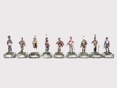 A collection of silver, marble, and enamel sculptures. Italy, 1920.