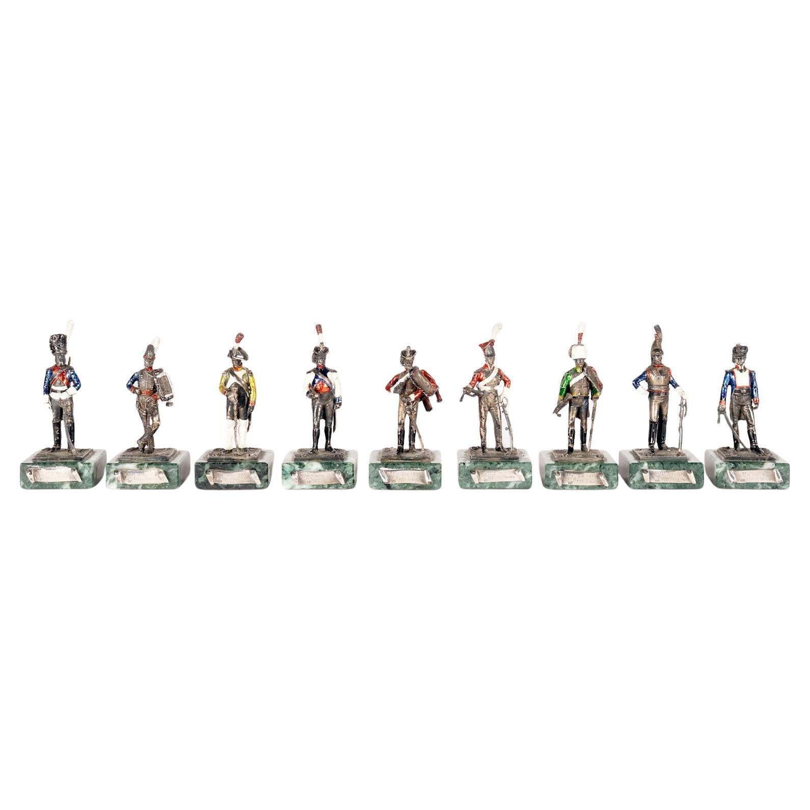 A collection of silver, marble, and enamel sculptures. Italy, 1920.