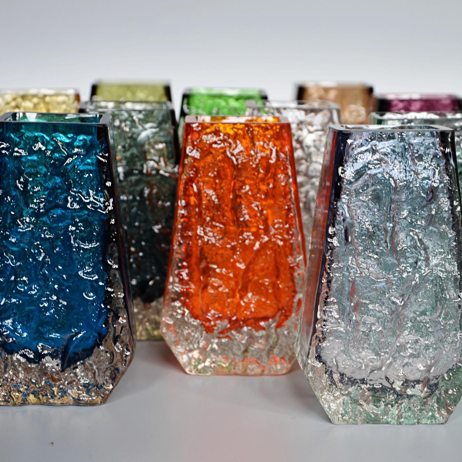 A collection of fourteen textured 'Coffin' bark vases in various colors designed by Geoffrey Baxter for Whitefriars glass factory.

Designer: Geoffrey Baxter (1922-1995)

Geoffrey Baxter was one of the most influential and significant British
