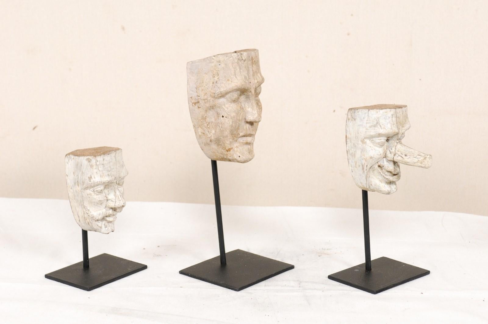 Hand-Carved Collection of Three Mid-20th Century Mask Molds from Ecuador on Custom Stands
