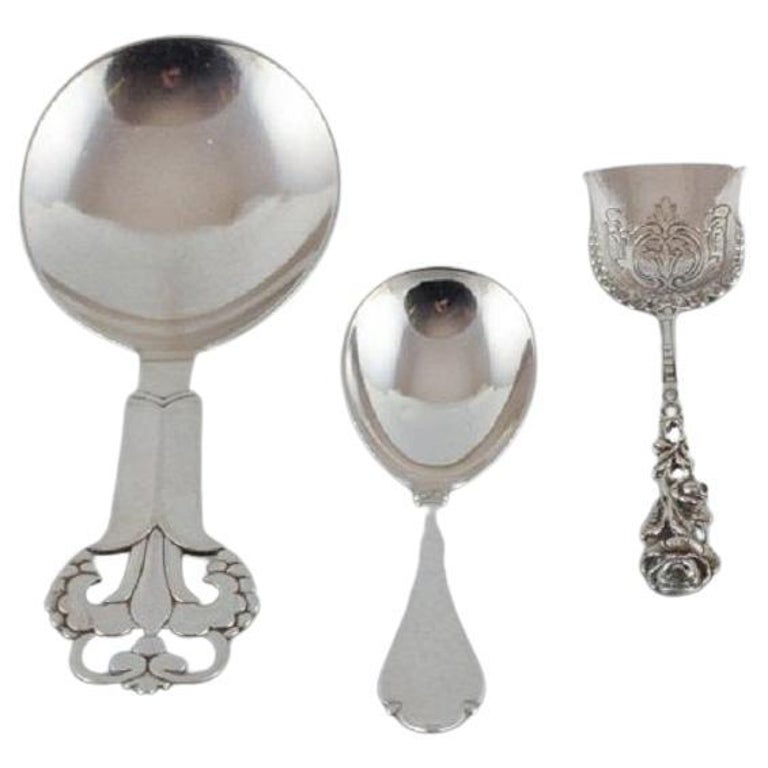 A collection of three silver spoons. For Sale at 1stDibs