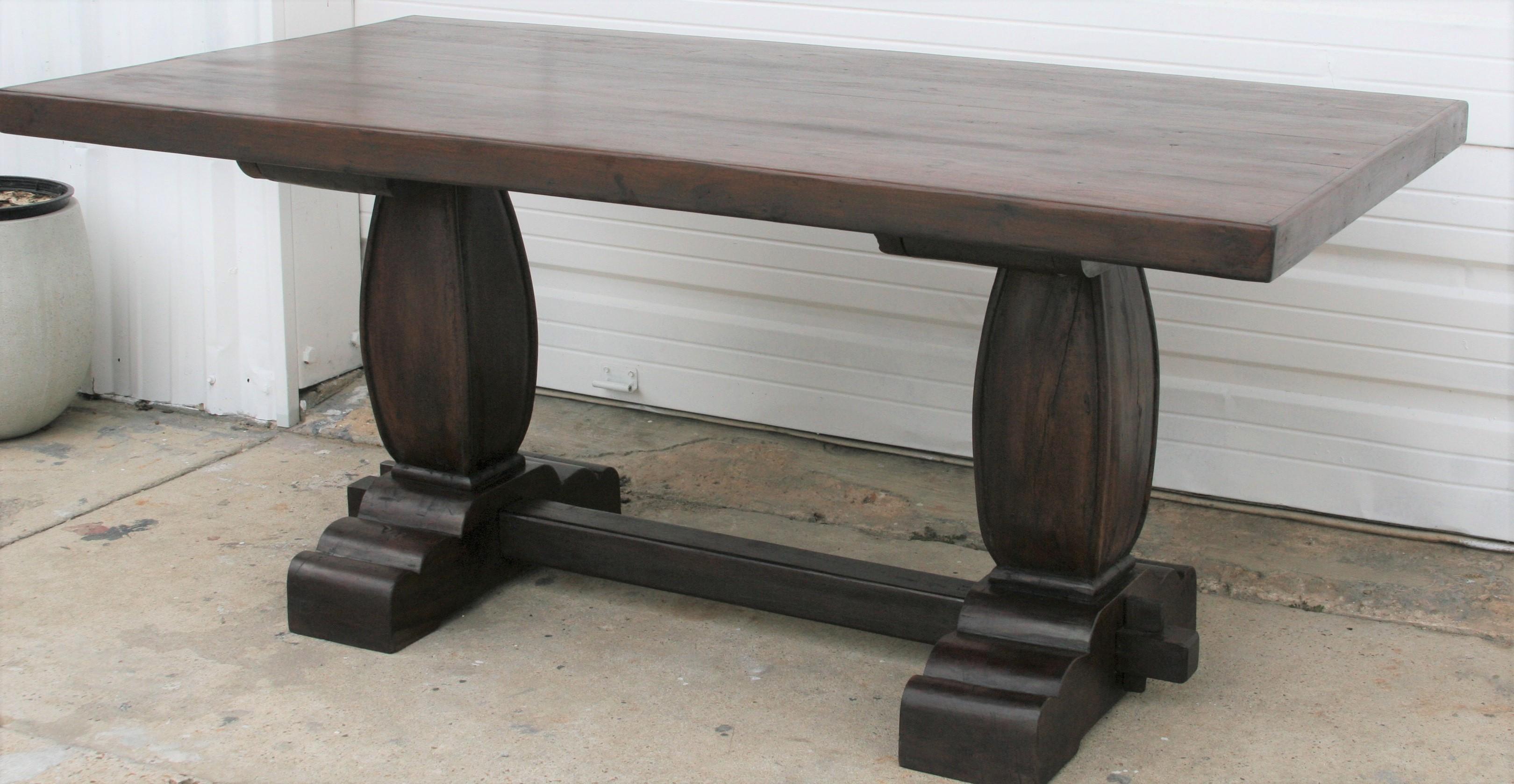 This inimitable heavily made solid teak wood table has everything one could wish for in a traditional family table. It is 100% teak and is almost indestructible. It is meant to last generations. Unmatched mellowing wood patina. Fine wood grain. Old