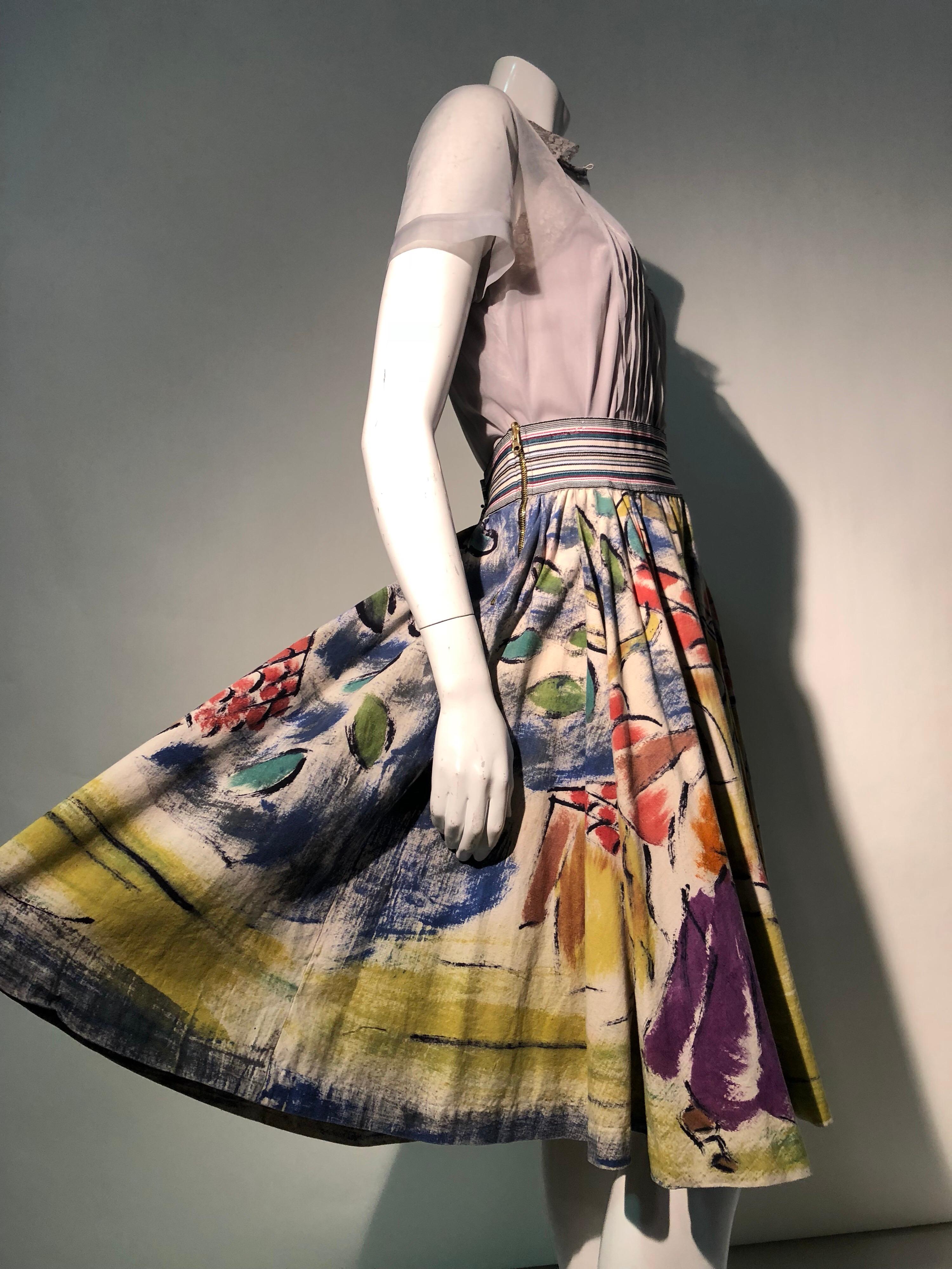 A wonderful 1950s pairing: a colorful hand-painted Mexican cotton circle skirt with a village scene and 