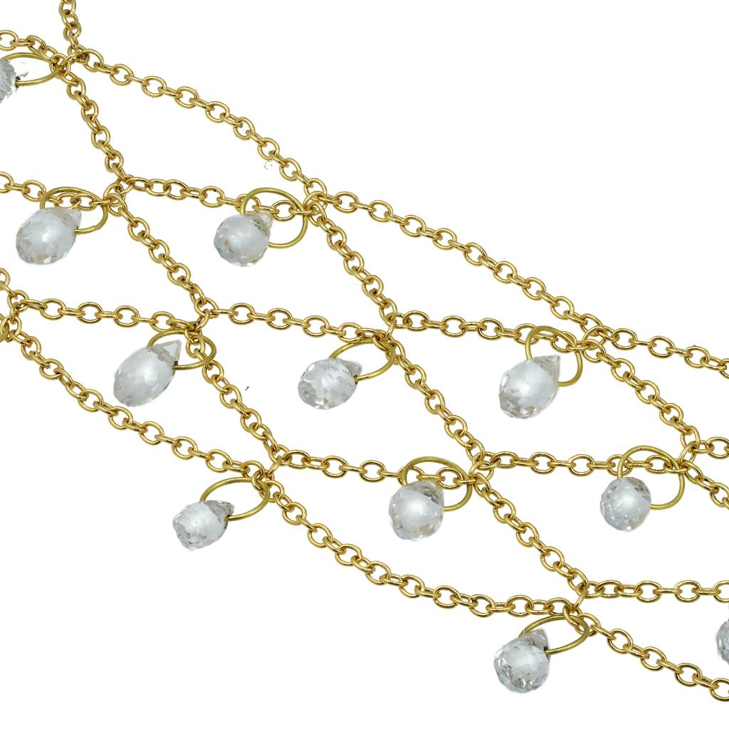 A colourless topaz necklace by Lucie Heskett-Brem, the Gold Weaver of Lucerne, consisting of twenty-two briolette-cut colourless topaz each measuring approximately 3x5mm, all suspended by yellow gold chain, hallmarked 18ct London, 2019, bearing the