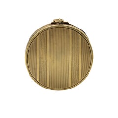 Compact of Textured Gold Patterns, Opening to Reveal a Fitted Mirror