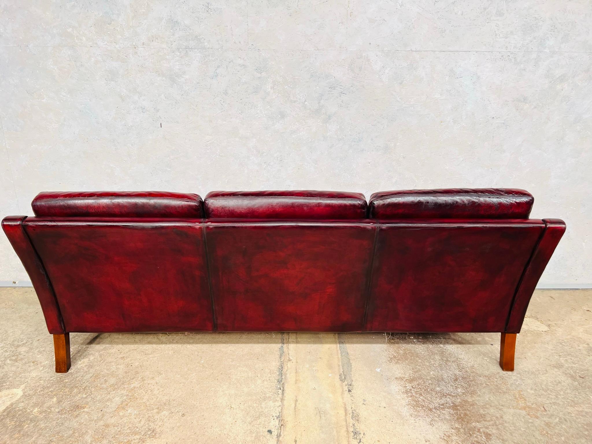 A Compact Vintage Danish 1970s Deep Red Three Seater Leather Sofa For Sale 5