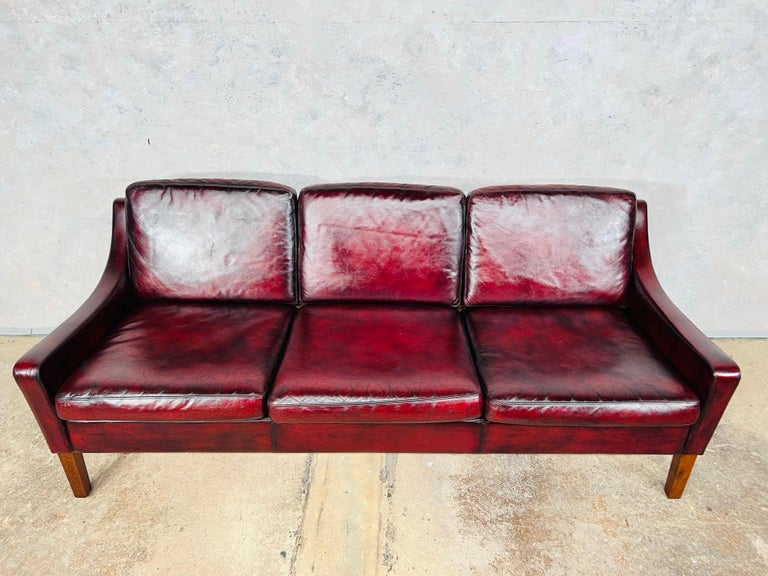 A Compact Vintage Danish 1970s Deep Red Three Seater Leather Sofa For ...
