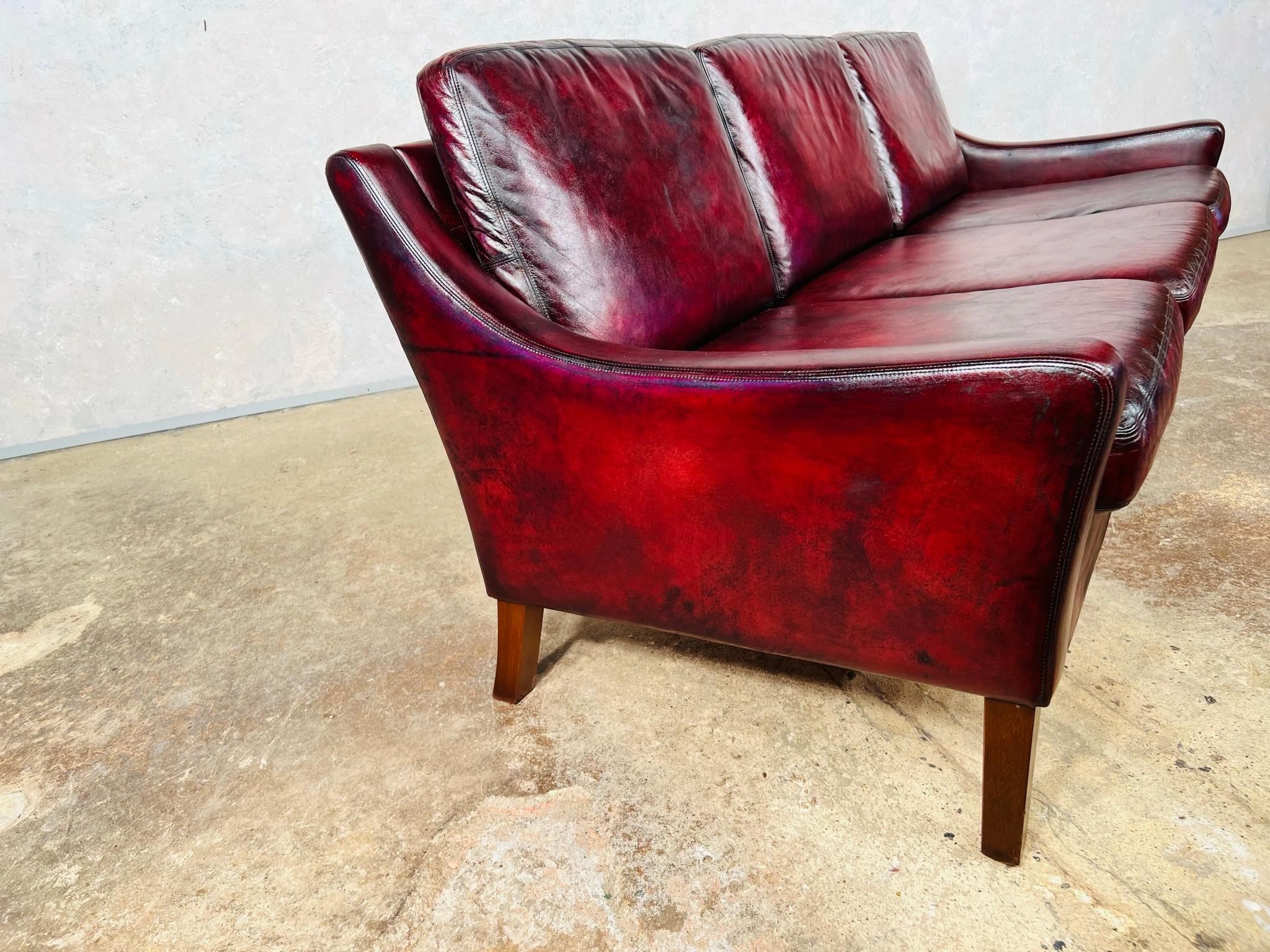 A Compact Vintage Danish 1970s Deep Red Three Seater Leather Sofa For Sale 2