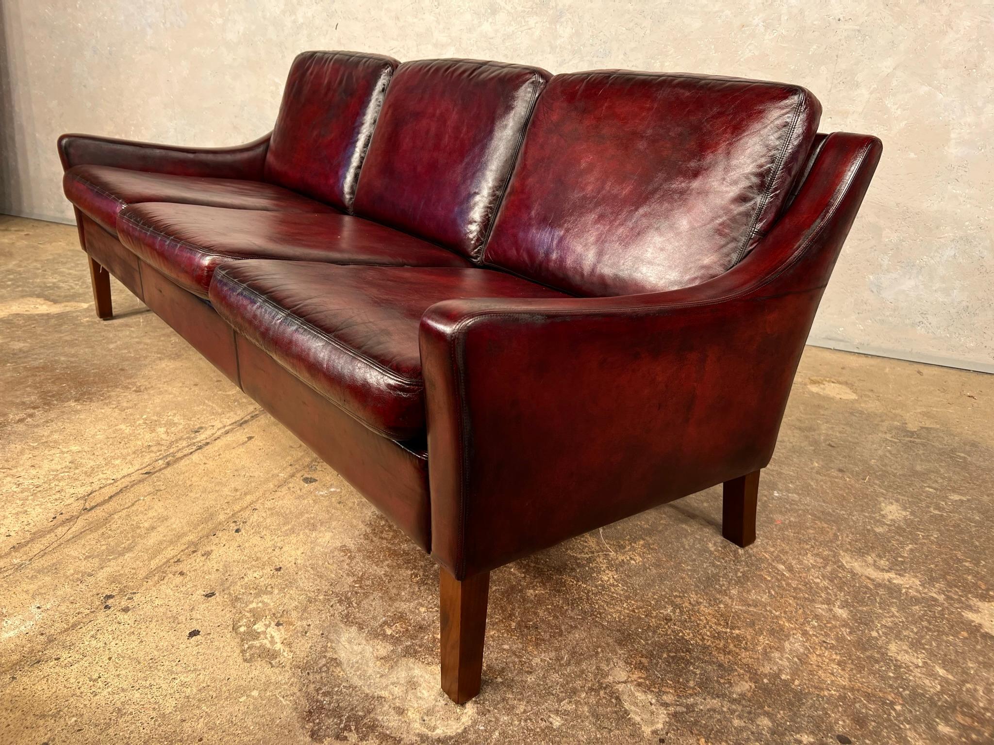 A Compact Vintage Danish 1970s Deep Red Three Seater Leather Sofa For Sale 3