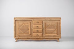 A Composition of Restrained Geometry: French Oak Credenza, 1940s