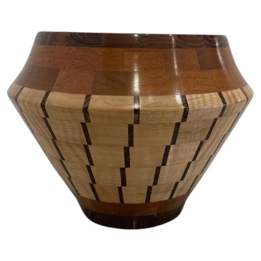 A contemporary "Alika" turned wood bowl by John Enloth. For Sale