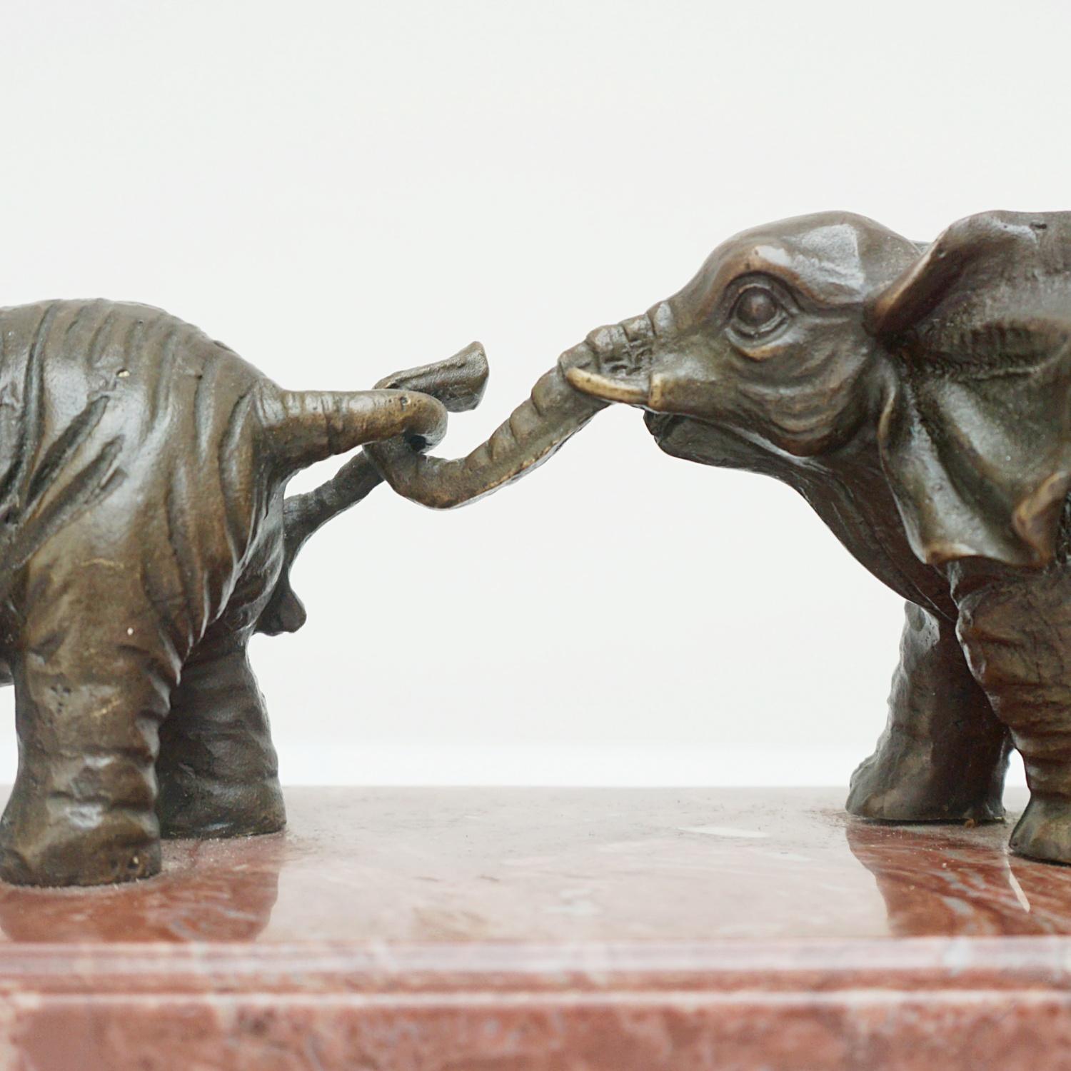 Contemporary Bronze Sculpture of a Herd of Elephants on a Marble Base 4