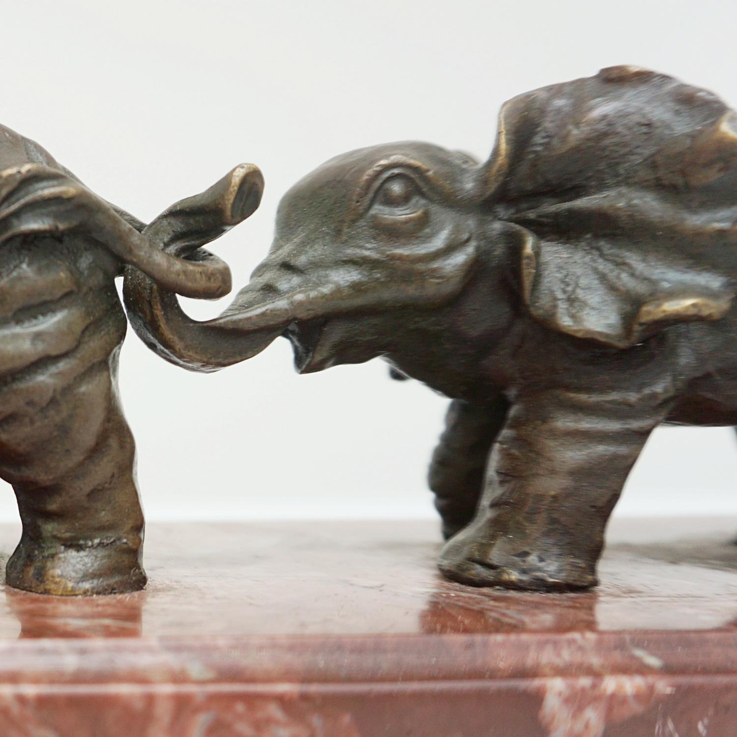 Contemporary Bronze Sculpture of a Herd of Elephants on a Marble Base 5