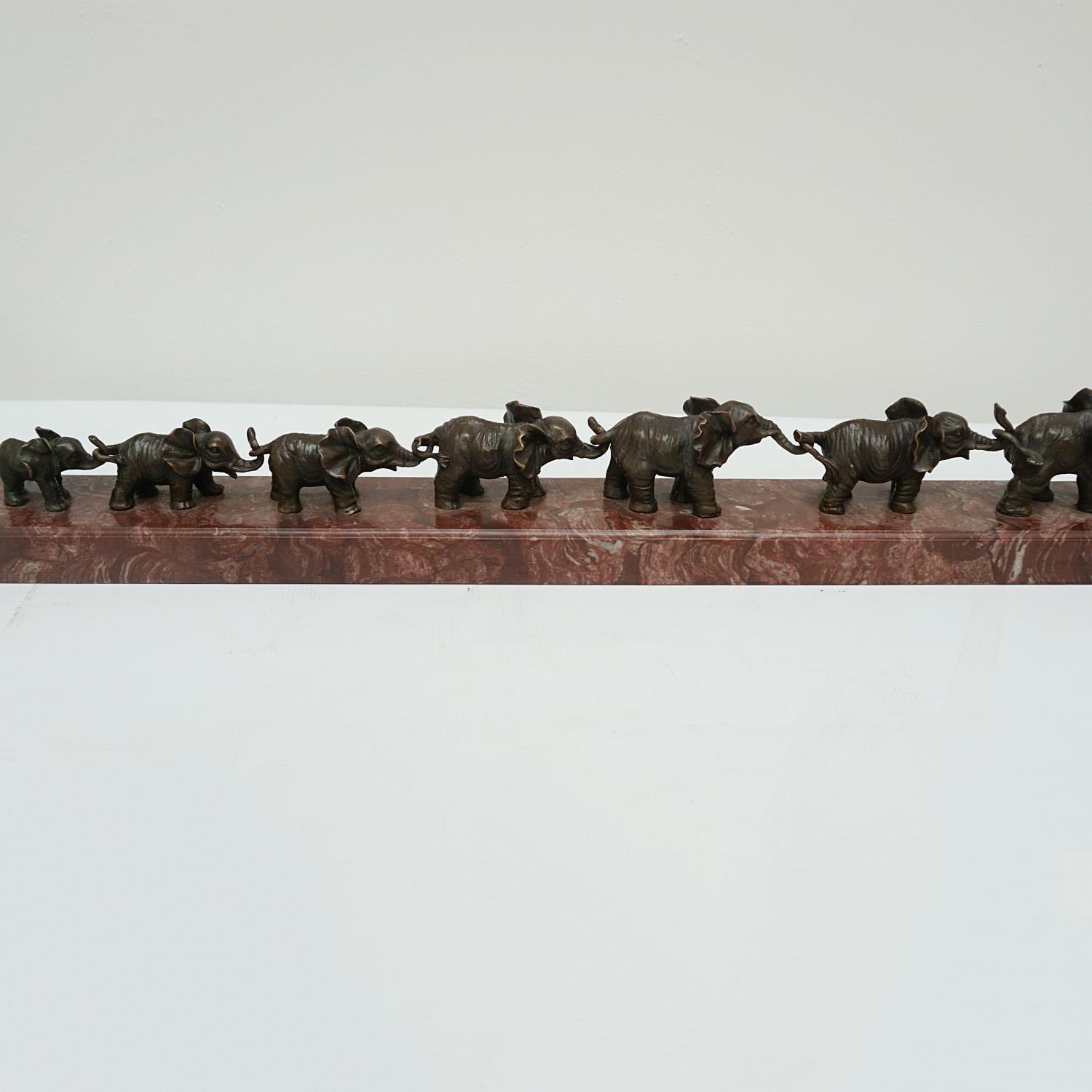 Contemporary Bronze Sculpture of a Herd of Elephants on a Marble Base 10