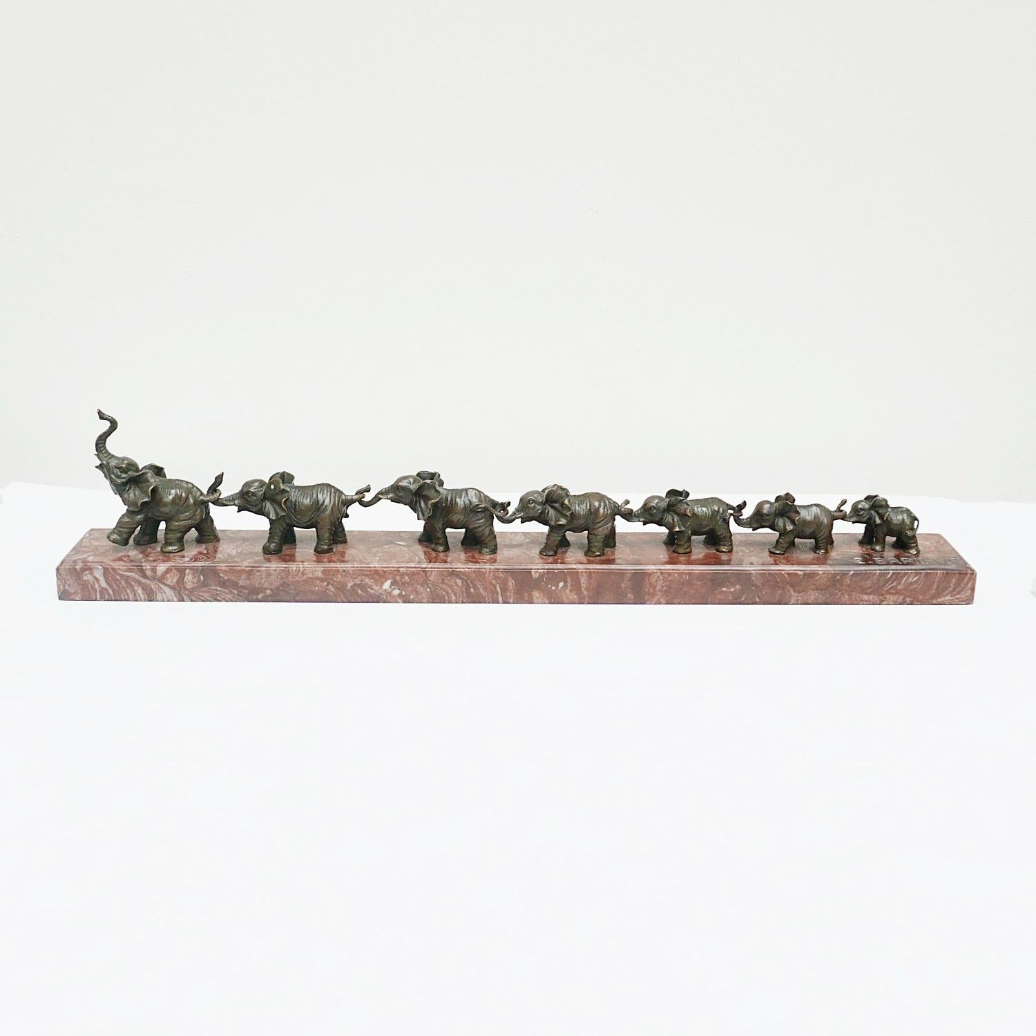 Contemporary Bronze Sculpture of a Herd of Elephants on a Marble Base 1