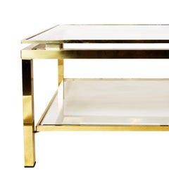 Tavolino da caffè in ottone e vetro dal design contemporaneo